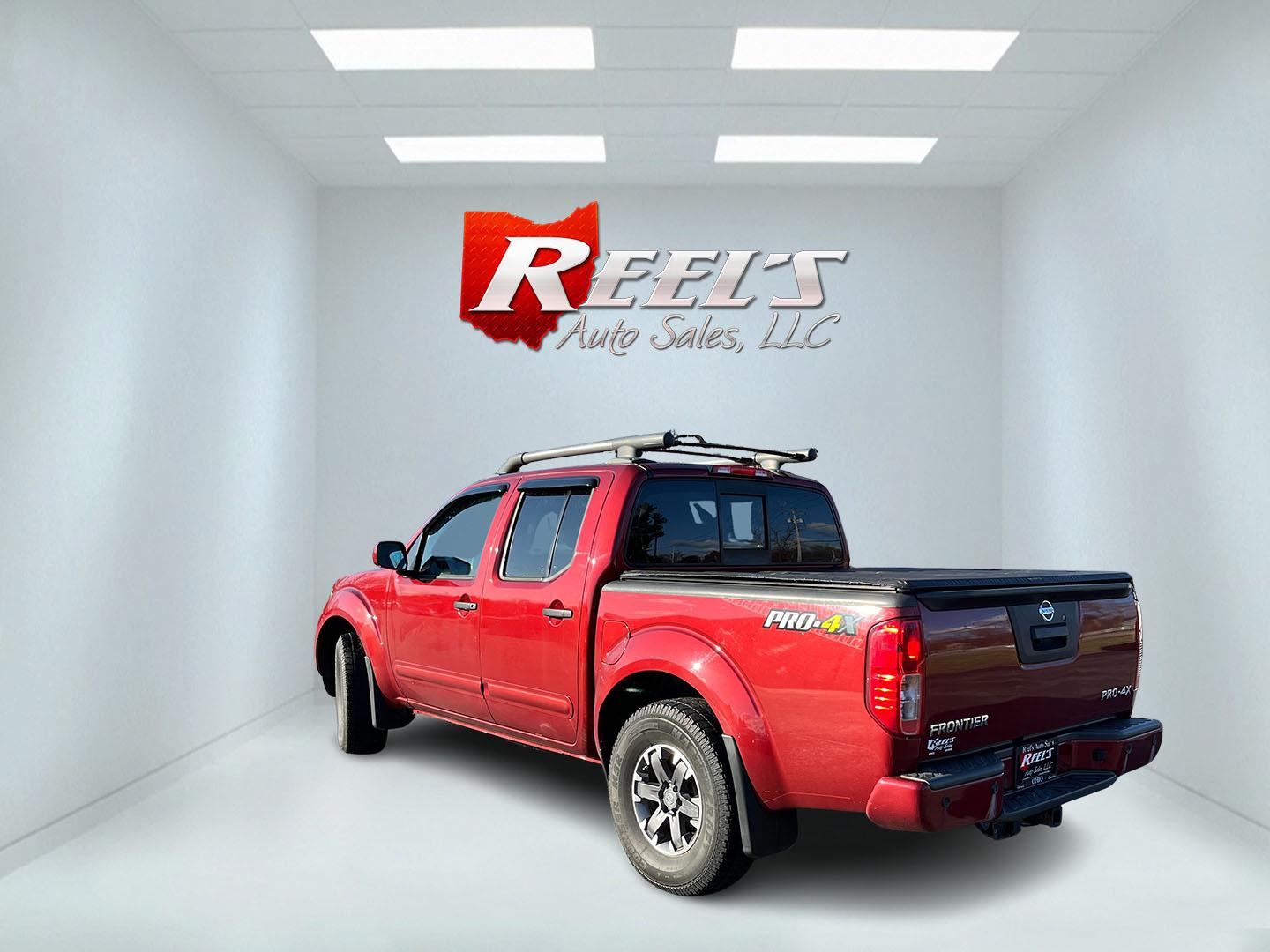 2018 Red /Gray Nissan Frontier Pro-4X Crew Cab 5AT 4WD (1N6AD0EV2JN) with an 4.0L V6 DOHC 24V engine, Automatic transmission, located at 11115 Chardon Rd. , Chardon, OH, 44024, (440) 214-9705, 41.580246, -81.241943 - 2018 Nissan Frontier Pro-4X Crew Cab 4WD – Off-Road Ready Beast with Premium Upgrades and Serious Towing Muscle! This tough 2018 Nissan Frontier Pro-4X Crew Cab 4WD is built for adventure and work alike – the real deal off-roader that still delivers everyday comfort! Powered by the proven 4.0L - Photo#9