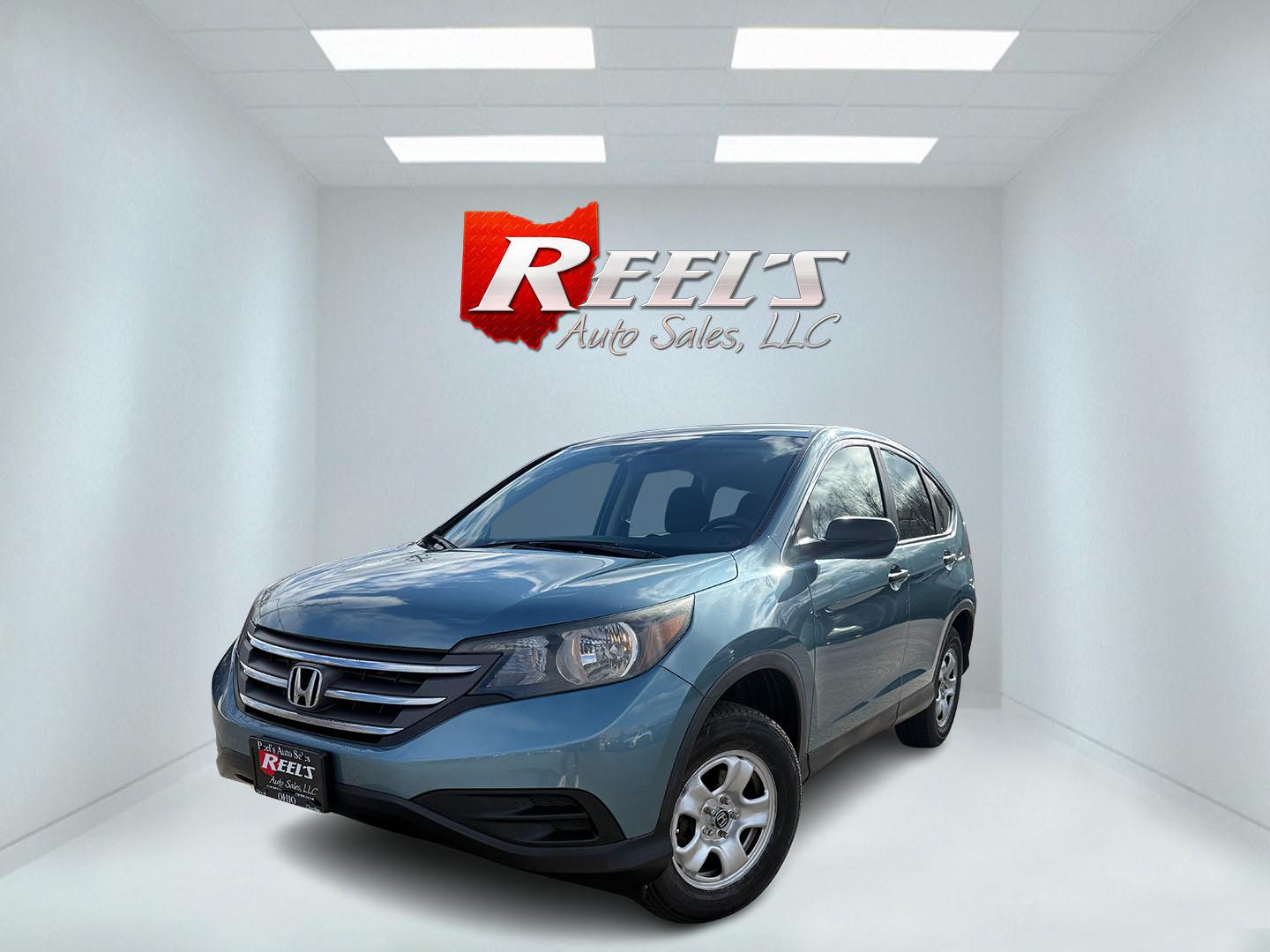 2014 Blue /Gray Honda CR-V LX 4WD 5-Speed AT (2HKRM4H32EH) with an 2.4L I4 DOHC 16V engine, Automatic transmission, located at 547 E. Main St., Orwell, OH, 44076, (440) 437-5893, 41.535435, -80.847855 - 2014 Honda CR-V LX AWD – Dependable All-Weather Crossover with Honda Reliability and Smart Efficiency! This clean 2014 Honda CR-V LX AWD is the ultimate practical SUV that’s built to last, handles Ohio winters with ease, and keeps your wallet happy! Powered by the smooth and efficient 2.4L I4 e - Photo#0