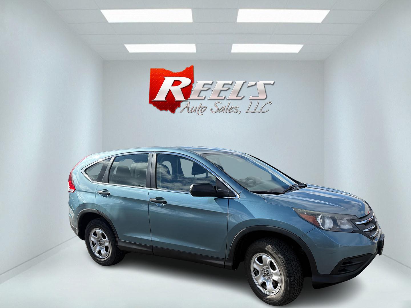 2014 Blue /Gray Honda CR-V LX 4WD 5-Speed AT (2HKRM4H32EH) with an 2.4L I4 DOHC 16V engine, Automatic transmission, located at 547 E. Main St., Orwell, OH, 44076, (440) 437-5893, 41.535435, -80.847855 - 2014 Honda CR-V LX AWD – Dependable All-Weather Crossover with Honda Reliability and Smart Efficiency! This clean 2014 Honda CR-V LX AWD is the ultimate practical SUV that’s built to last, handles Ohio winters with ease, and keeps your wallet happy! Powered by the smooth and efficient 2.4L I4 e - Photo#2
