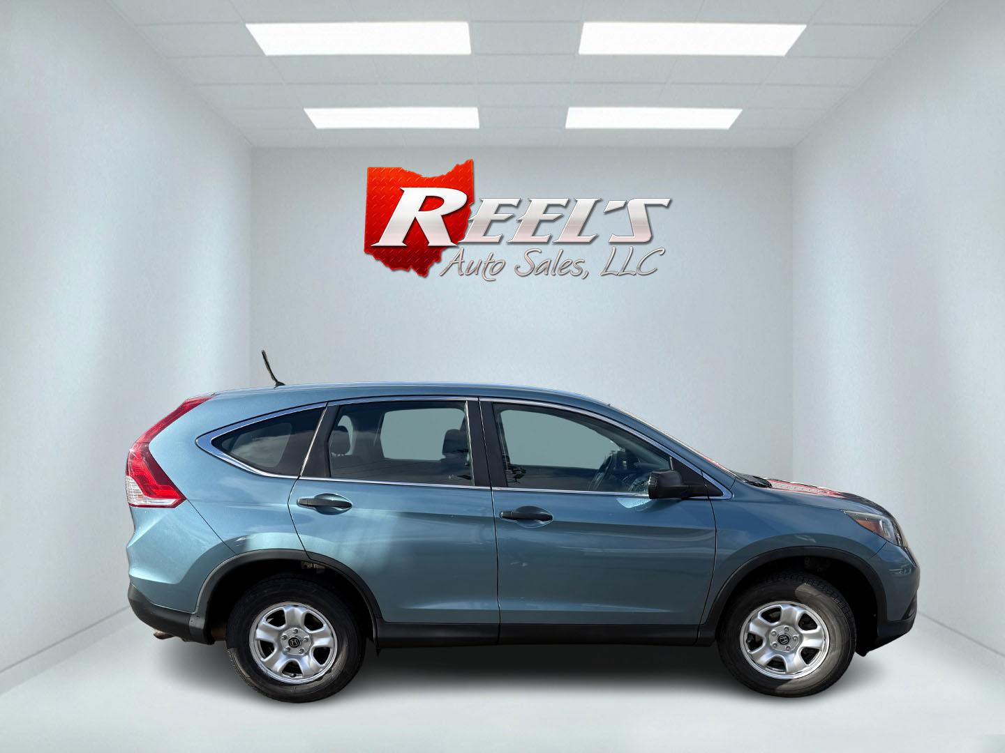 2014 Blue /Gray Honda CR-V LX 4WD 5-Speed AT (2HKRM4H32EH) with an 2.4L I4 DOHC 16V engine, Automatic transmission, located at 547 E. Main St., Orwell, OH, 44076, (440) 437-5893, 41.535435, -80.847855 - 2014 Honda CR-V LX AWD – Dependable All-Weather Crossover with Honda Reliability and Smart Efficiency! This clean 2014 Honda CR-V LX AWD is the ultimate practical SUV that’s built to last, handles Ohio winters with ease, and keeps your wallet happy! Powered by the smooth and efficient 2.4L I4 e - Photo#23