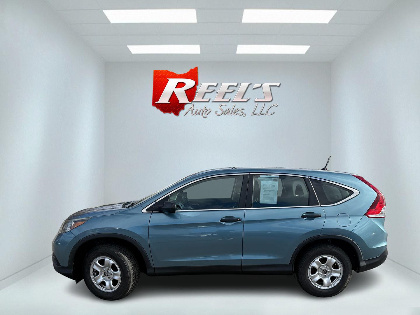 2014 Blue /Gray Honda CR-V LX 4WD 5-Speed AT (2HKRM4H32EH) with an 2.4L I4 DOHC 16V engine, Automatic transmission, located at 547 E. Main St., Orwell, OH, 44076, (440) 437-5893, 41.535435, -80.847855 - 2014 Honda CR-V LX AWD – Dependable All-Weather Crossover with Honda Reliability and Smart Efficiency! This clean 2014 Honda CR-V LX AWD is the ultimate practical SUV that’s built to last, handles Ohio winters with ease, and keeps your wallet happy! Powered by the smooth and efficient 2.4L I4 e - Photo#30