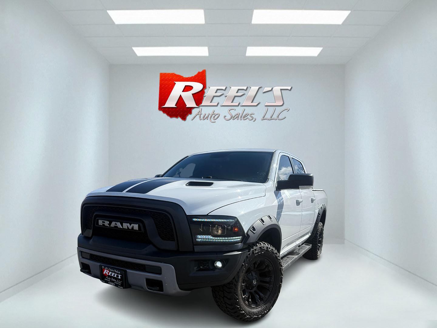 2016 White /Black RAM 1500 Rebel Crew Cab SWB 4WD (1C6RR7YT8GS) with an 5.7L V8 OHV 16V engine, Automatic transmission, located at 11115 Chardon Rd. , Chardon, OH, 44024, (440) 214-9705, 41.580246, -81.241943 - 2016 Ram 1500 Rebel Crew Cab 4WD – Aggressive Off-Road Beast with HEMI Muscle and Loaded Premium Upgrades! This 2016 Ram 1500 Rebel Crew Cab 4WD is the ultimate combination of factory off-road attitude and serious capability upgrades! Powered by the legendary 5.7L HEMI V8 engine paired with a smo - Photo#0