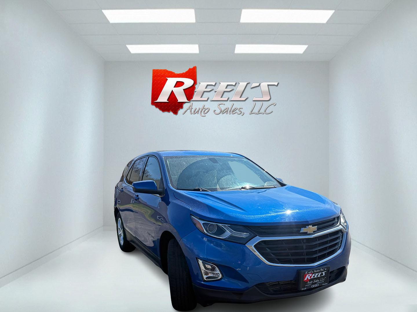 2019 Blue /Black Chevrolet Equinox LT AWD (3GNAXUEVXKS) with an 1.5L I4 DOHC 16V TURBO engine, Automatic transmission, located at 11115 Chardon Rd. , Chardon, OH, 44024, (440) 214-9705, 41.580246, -81.241943 - 2019 Chevrolet Equinox LT AWD – Efficient Turbo Crossover Loaded with Comfort, Safety, and All-Weather Confidence! This sharp 2019 Chevrolet Equinox LT AWD is the perfect everyday SUV that delivers style, efficiency, and smart features without compromise! Powered by a responsive 1.5L Turbocharged - Photo#2