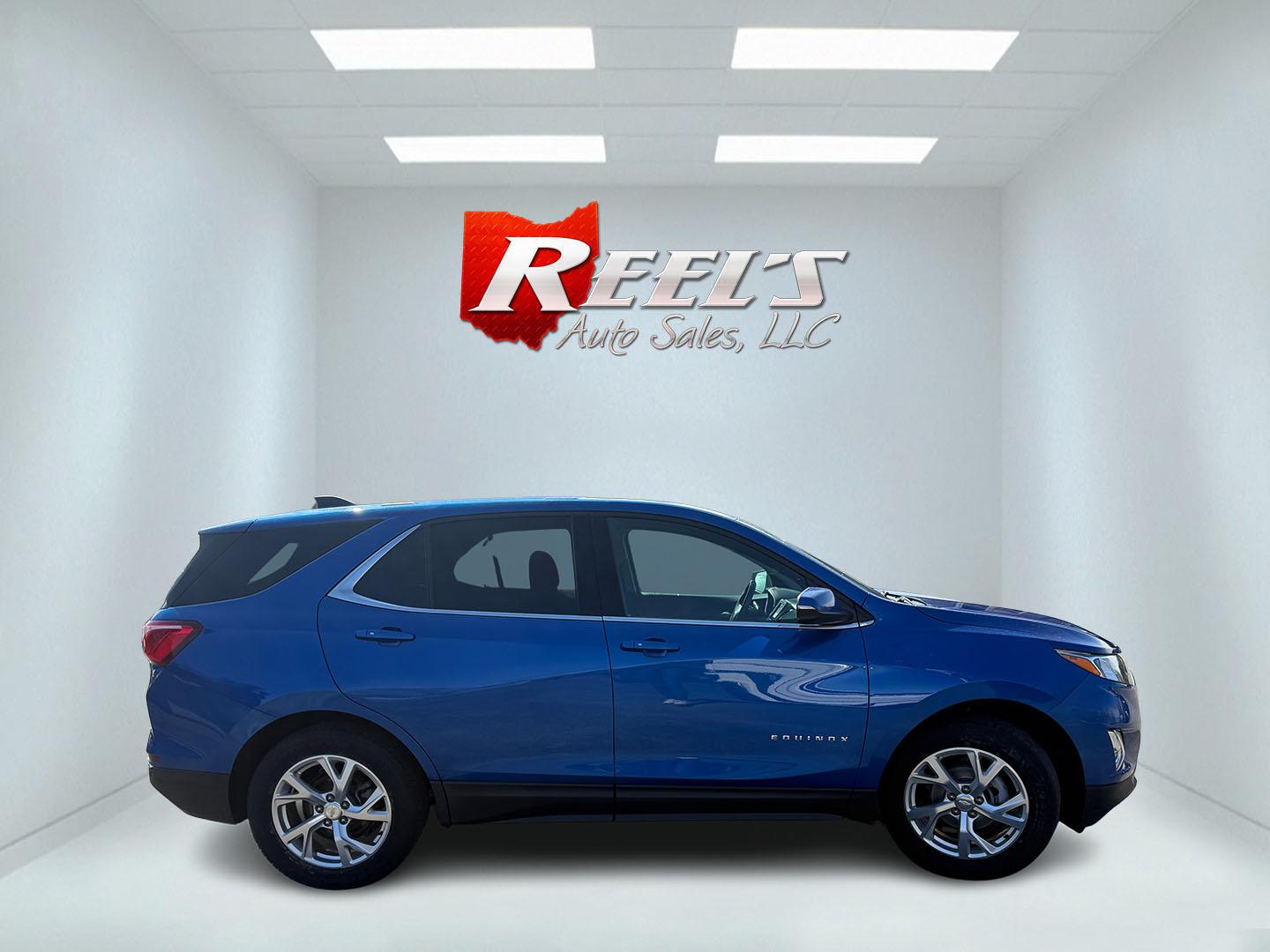 2019 Blue /Black Chevrolet Equinox LT AWD (3GNAXUEVXKS) with an 1.5L I4 DOHC 16V TURBO engine, Automatic transmission, located at 11115 Chardon Rd. , Chardon, OH, 44024, (440) 214-9705, 41.580246, -81.241943 - 2019 Chevrolet Equinox LT AWD – Efficient Turbo Crossover Loaded with Comfort, Safety, and All-Weather Confidence! This sharp 2019 Chevrolet Equinox LT AWD is the perfect everyday SUV that delivers style, efficiency, and smart features without compromise! Powered by a responsive 1.5L Turbocharged - Photo#5