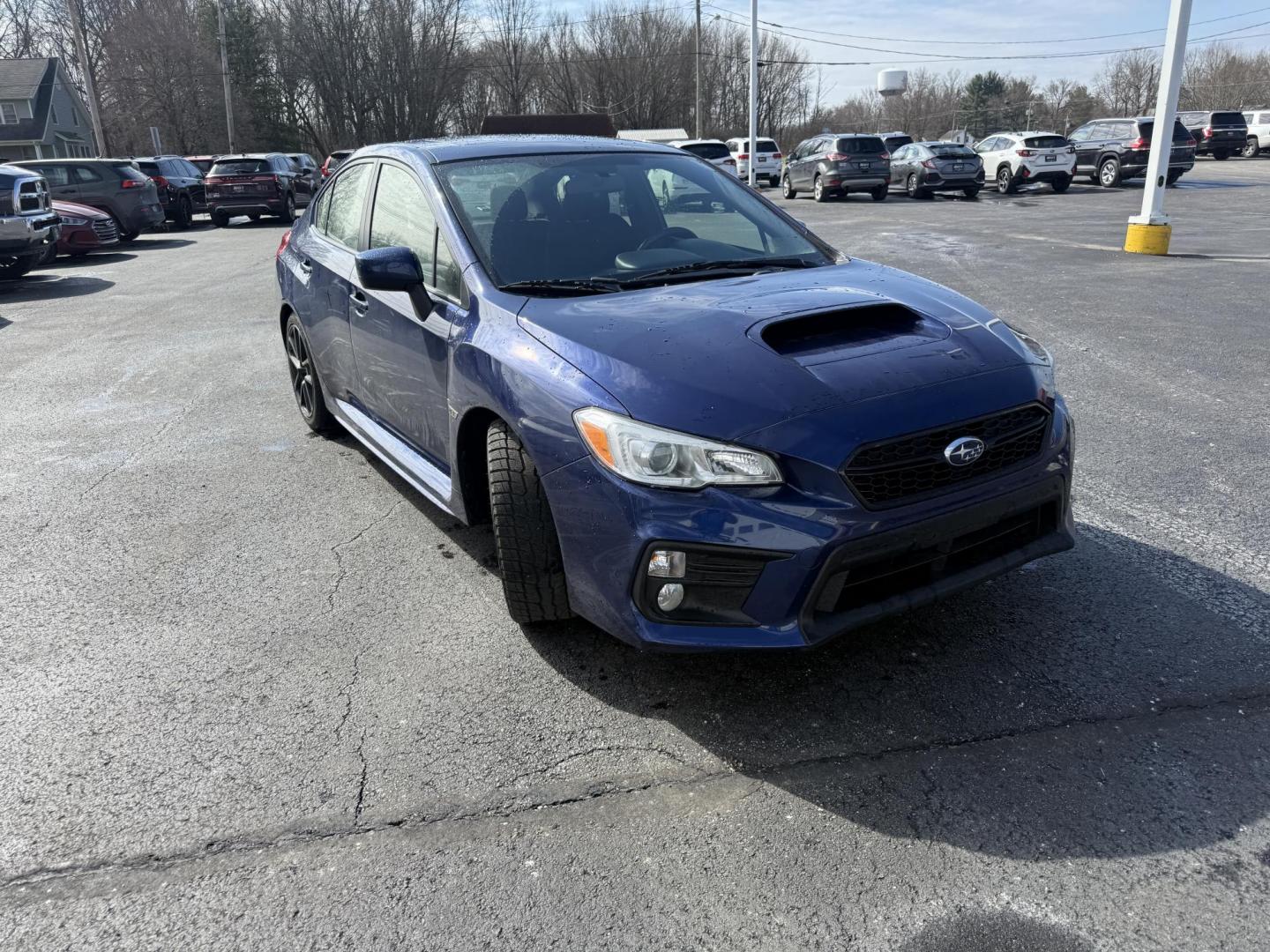 2021 Blue /Black Subaru WRX Premium CVT (JF1VA1F69M8) with an 2.0L H4 DOHC 16V Turbo engine, Automatic transmission, located at 547 E. Main St., Orwell, OH, 44076, (440) 437-5893, 41.535435, -80.847855 - 2021 Subaru WRX – Turbocharged Rally-Bred Performance with All-Weather Grip and Loaded Sport Features! This 2021 Subaru WRX is pure driving excitement wrapped in legendary Subaru toughness! The heart-pounding 2.0L H4 Turbocharged engine unleashes 268 HP and rockets you from 0-60 in just 5.5 secon - Photo#2