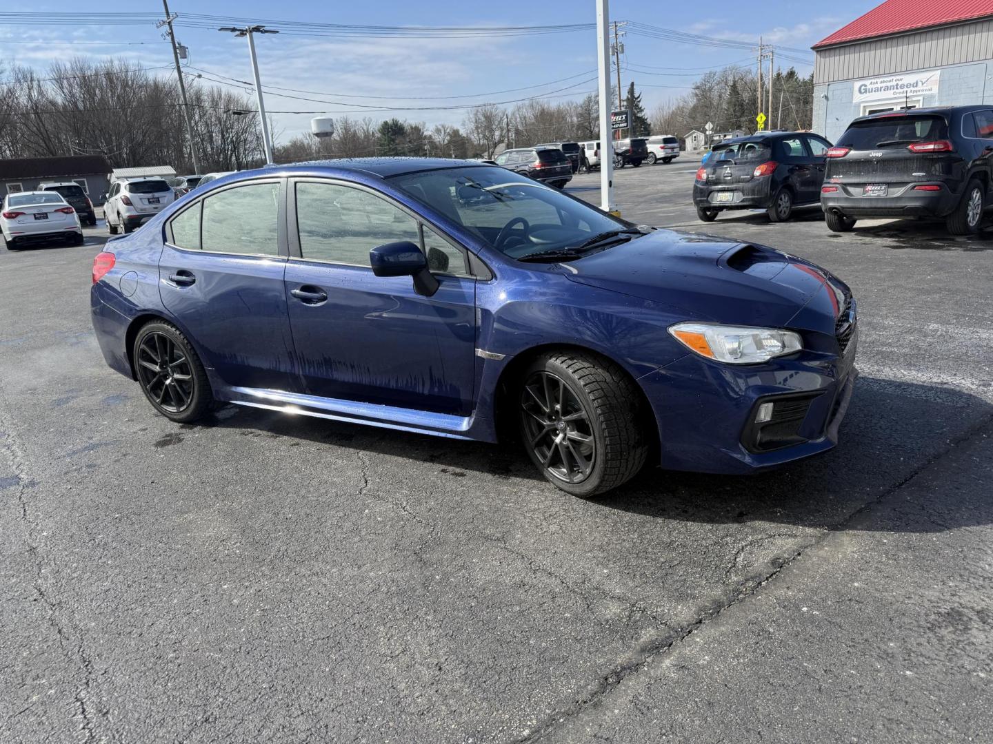 2021 Blue /Black Subaru WRX Premium CVT (JF1VA1F69M8) with an 2.0L H4 DOHC 16V Turbo engine, Automatic transmission, located at 547 E. Main St., Orwell, OH, 44076, (440) 437-5893, 41.535435, -80.847855 - 2021 Subaru WRX – Turbocharged Rally-Bred Performance with All-Weather Grip and Loaded Sport Features! This 2021 Subaru WRX is pure driving excitement wrapped in legendary Subaru toughness! The heart-pounding 2.0L H4 Turbocharged engine unleashes 268 HP and rockets you from 0-60 in just 5.5 secon - Photo#3