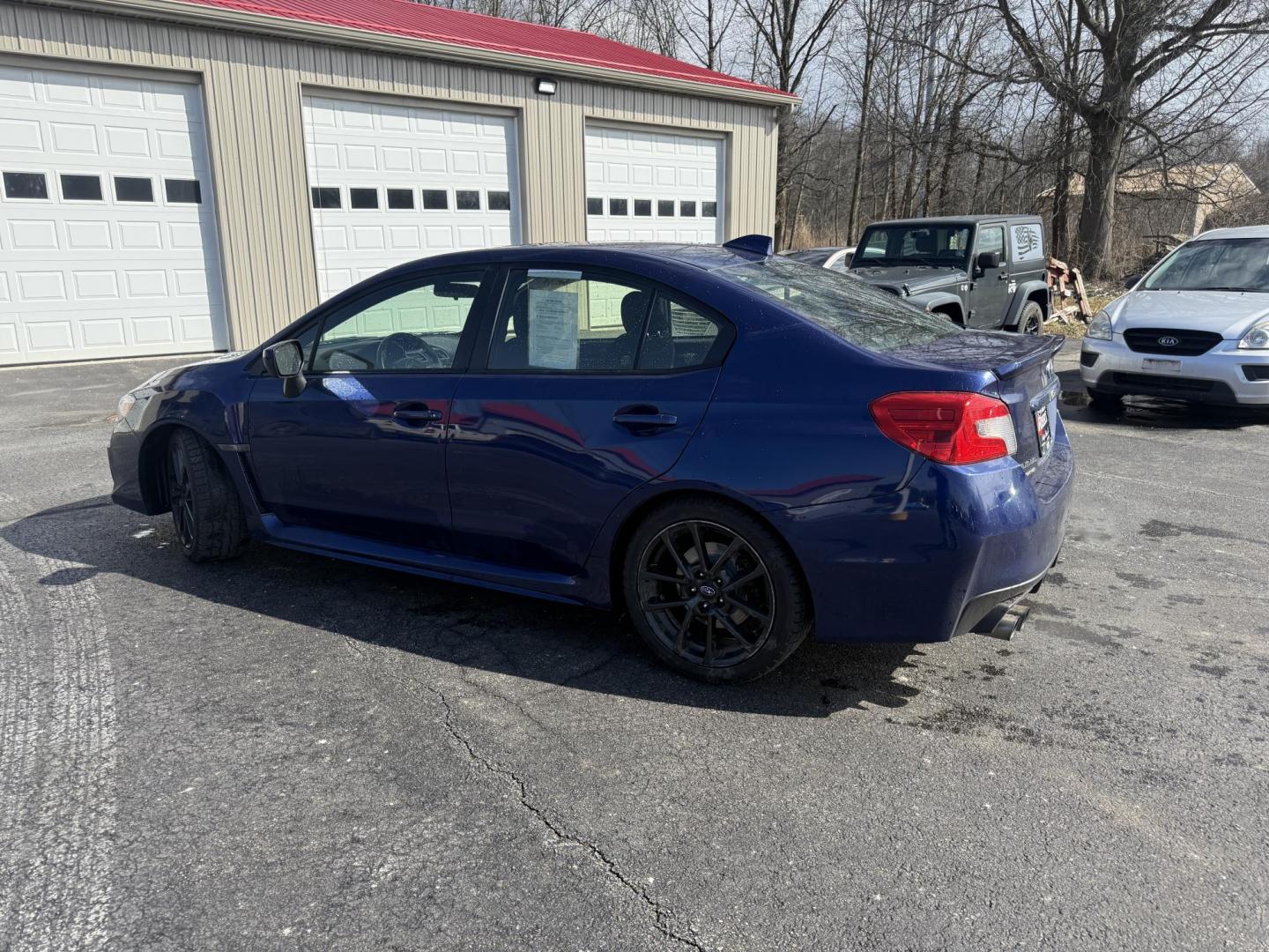2021 Blue /Black Subaru WRX Premium CVT (JF1VA1F69M8) with an 2.0L H4 DOHC 16V Turbo engine, Automatic transmission, located at 547 E. Main St., Orwell, OH, 44076, (440) 437-5893, 41.535435, -80.847855 - 2021 Subaru WRX – Turbocharged Rally-Bred Performance with All-Weather Grip and Loaded Sport Features! This 2021 Subaru WRX is pure driving excitement wrapped in legendary Subaru toughness! The heart-pounding 2.0L H4 Turbocharged engine unleashes 268 HP and rockets you from 0-60 in just 5.5 secon - Photo#33