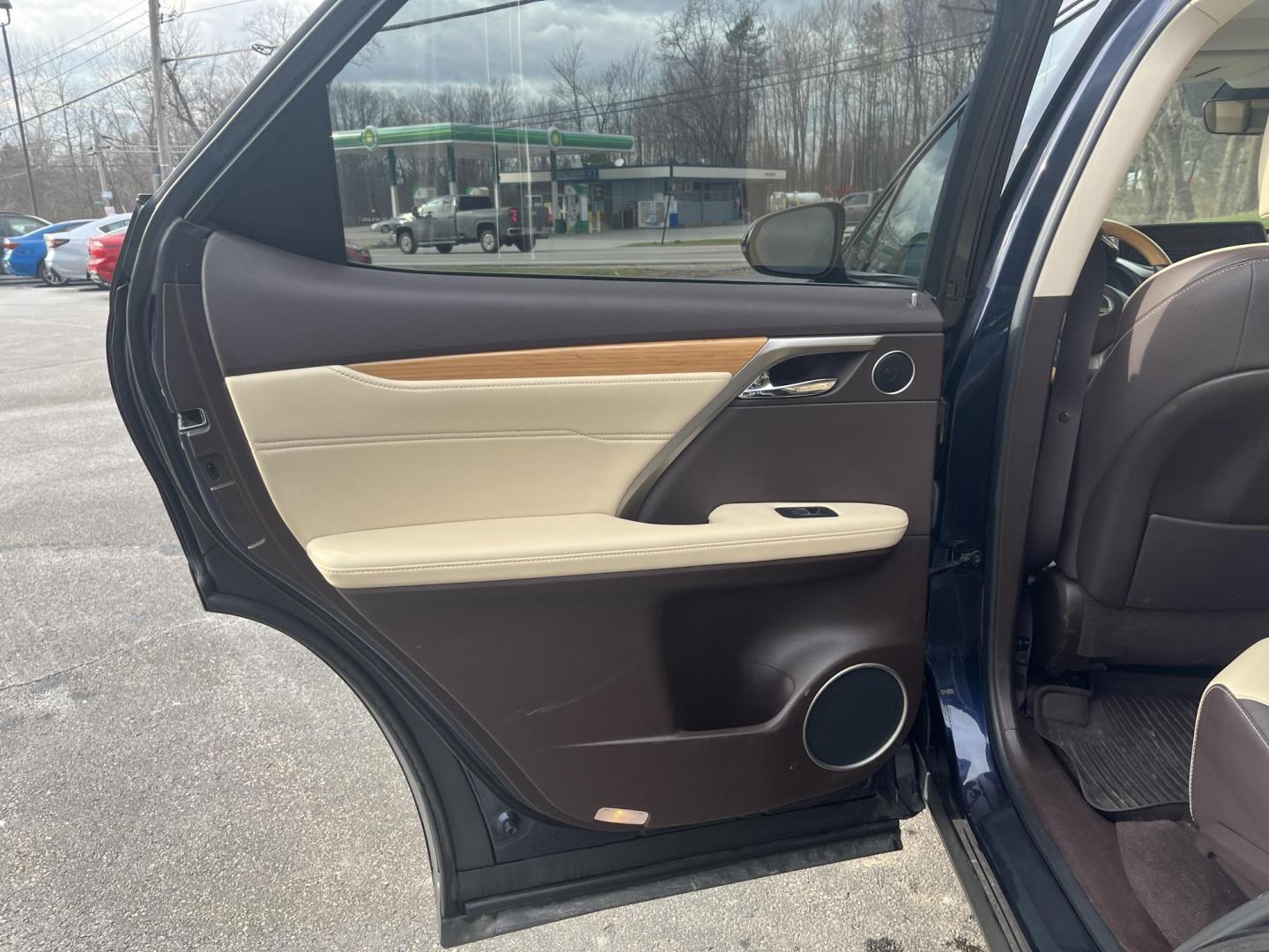 2019 Blue /Tan Lexus RX 350L Luxury AWD (JTJDZKCA1K2) with an 3.5L V6 DOHC 24V engine, Automatic transmission, located at 11115 Chardon Rd. , Chardon, OH, 44024, (440) 214-9705, 41.580246, -81.241943 - 2019 Lexus RX 350L AWD – Spacious 3-Row Luxury SUV with Premium Refinement, Safety, and All-Weather Confidence! This stunning 2019 Lexus RX 350L AWD is the ultimate upscale family hauler that combines legendary Lexus reliability, room for seven, and every premium feature you could want! Powered b - Photo#35