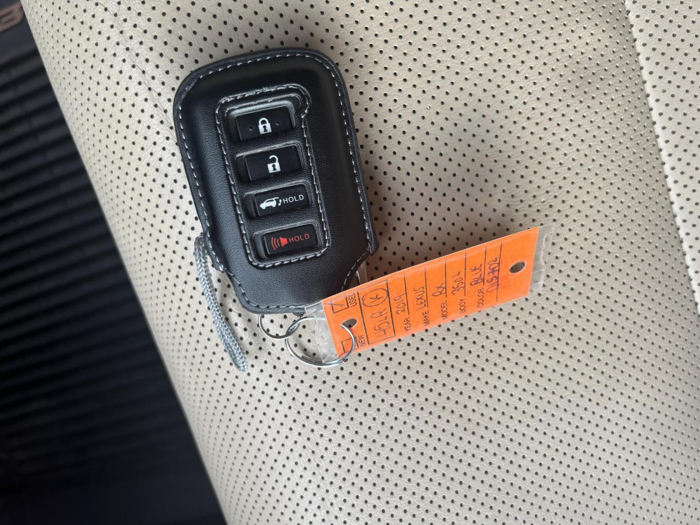 2019 Blue /Tan Lexus RX 350L Luxury AWD (JTJDZKCA1K2) with an 3.5L V6 DOHC 24V engine, Automatic transmission, located at 11115 Chardon Rd. , Chardon, OH, 44024, (440) 214-9705, 41.580246, -81.241943 - 2019 Lexus RX 350L AWD – Spacious 3-Row Luxury SUV with Premium Refinement, Safety, and All-Weather Confidence! This stunning 2019 Lexus RX 350L AWD is the ultimate upscale family hauler that combines legendary Lexus reliability, room for seven, and every premium feature you could want! Powered b - Photo#42