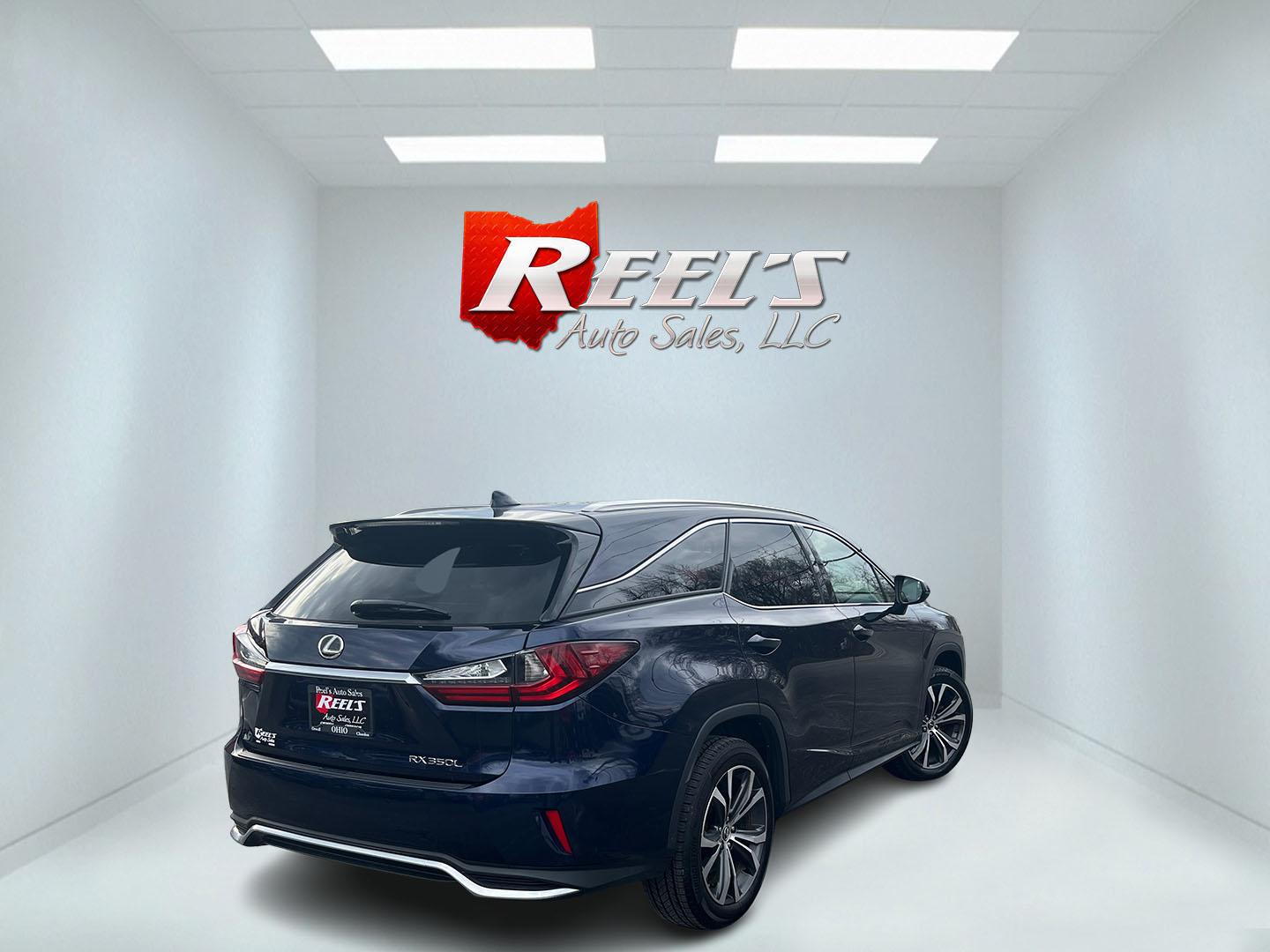 2019 Blue /Tan Lexus RX 350L Luxury AWD (JTJDZKCA1K2) with an 3.5L V6 DOHC 24V engine, Automatic transmission, located at 11115 Chardon Rd. , Chardon, OH, 44024, (440) 214-9705, 41.580246, -81.241943 - 2019 Lexus RX 350L AWD – Spacious 3-Row Luxury SUV with Premium Refinement, Safety, and All-Weather Confidence! This stunning 2019 Lexus RX 350L AWD is the ultimate upscale family hauler that combines legendary Lexus reliability, room for seven, and every premium feature you could want! Powered b - Photo#6