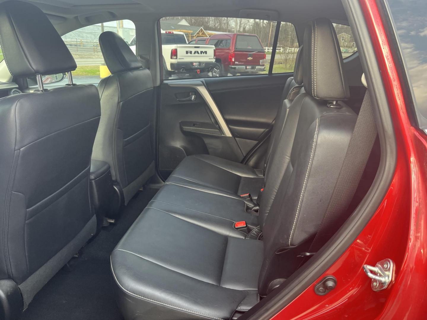 2014 Red /Black Toyota RAV4 Limited AWD (2T3DFREV5EW) with an 2.5L I4 DOHC 16V engine, Automatic transmission, located at 11115 Chardon Rd. , Chardon, OH, 44024, (440) 214-9705, 41.580246, -81.241943 - 2014 Toyota RAV4 Limited AWD – Premium Compact SUV with Legendary Reliability, Loaded Luxury, and All-Weather Confidence! This 2014 Toyota RAV4 Limited AWD is the perfect upscale crossover that combines Toyota’s bulletproof durability with premium comfort and smart features! Powered by a smooth - Photo#32