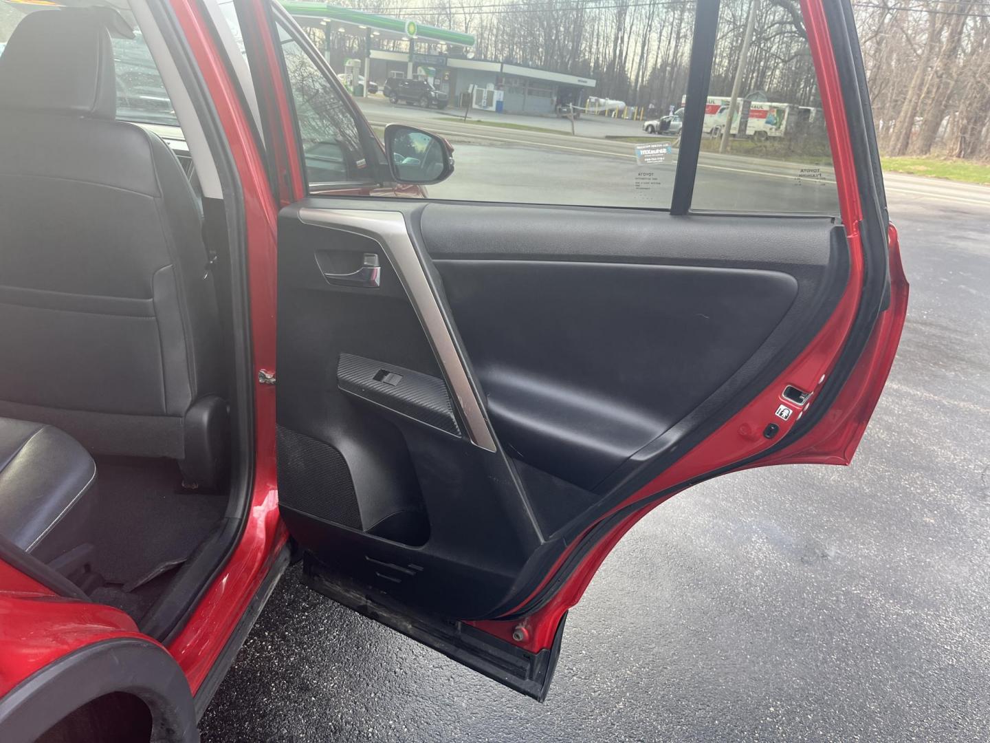2014 Red /Black Toyota RAV4 Limited AWD (2T3DFREV5EW) with an 2.5L I4 DOHC 16V engine, Automatic transmission, located at 11115 Chardon Rd. , Chardon, OH, 44024, (440) 214-9705, 41.580246, -81.241943 - 2014 Toyota RAV4 Limited AWD – Premium Compact SUV with Legendary Reliability, Loaded Luxury, and All-Weather Confidence! This 2014 Toyota RAV4 Limited AWD is the perfect upscale crossover that combines Toyota’s bulletproof durability with premium comfort and smart features! Powered by a smooth - Photo#33