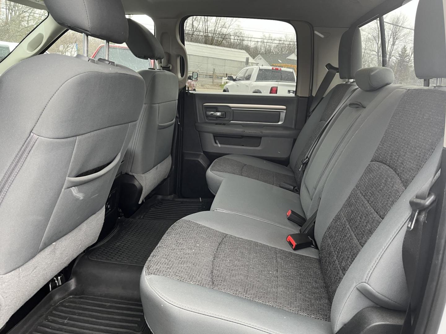 2018 White /Black RAM 1500 Big Horn Crew Cab SWB 4WD (1C6RR7LT4JS) with an 5.7L V8 OHV 16V engine, Automatic transmission, located at 547 E. Main St., Orwell, OH, 44076, (440) 437-5893, 41.535435, -80.847855 - 2018 Ram 1500 Big Horn Crew Cab 4WD – HEMI-Powered Workhorse with Premium Touches and Serious Towing Muscle! This 2018 Ram 1500 Big Horn Crew Cab 4WD is the perfect full-size truck that blends everyday comfort, tough capability, and modern tech! Powered by the legendary 5.7L HEMI V8 engine paired - Photo#27