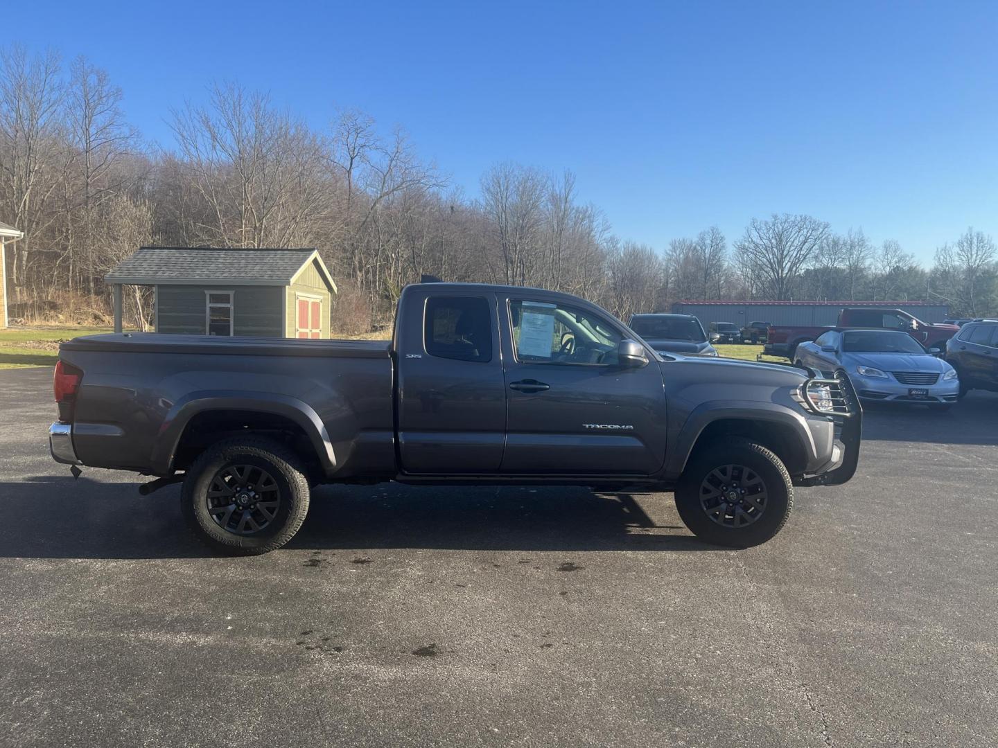 2021 Gray /Black Toyota Tacoma SR5 Access Cab V6 6AT 4WD (3TYSZ5AN8MT) with an 3.5L V6 DOHC 24V engine, Automatic transmission, located at 11115 Chardon Rd. , Chardon, OH, 44024, (440) 214-9705, 41.580246, -81.241943 - 2021 Toyota Tacoma SR5 Access Cab 4WD – Rugged, Reliable, and Loaded with Modern Safety & Tech! This 2021 Toyota Tacoma SR5 Access Cab 4WD is the perfect midsize truck that combines legendary Toyota toughness with modern features and real off-road capability! Powered by the strong 3.5L D-4S V6 en - Photo#5