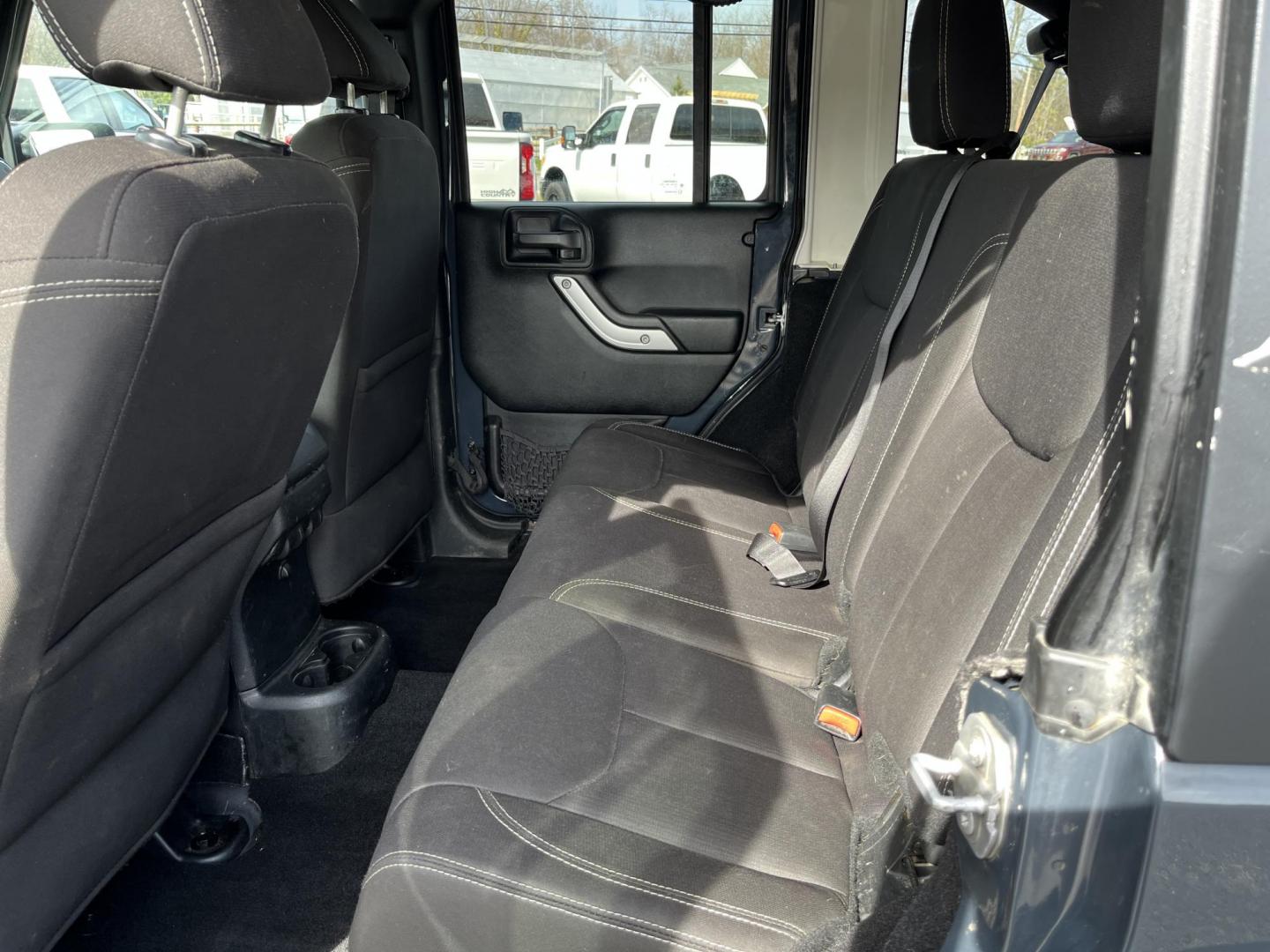 2017 Gray /Black Jeep Wrangler Unlimited Rubicon 4WD (1C4BJWFG8HL) with an 3.6L V6 DOHC 24V engine, Automatic transmission, located at 11115 Chardon Rd. , Chardon, OH, 44024, (440) 214-9705, 41.580246, -81.241943 - 2017 Jeep Wrangler Unlimited Rubicon – Trail-Conquering Beast with Full Rubicon Upgrades and Premium Features! This 2017 Jeep Wrangler Unlimited Rubicon is the ultimate off-road icon — highly capable, fun to drive, and loaded with factory Rubicon equipment! Powered by the reliable 3.6L Pentasta - Photo#25