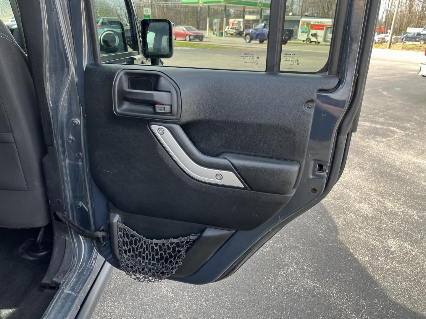 2017 Gray /Black Jeep Wrangler Unlimited Rubicon 4WD (1C4BJWFG8HL) with an 3.6L V6 DOHC 24V engine, Automatic transmission, located at 11115 Chardon Rd. , Chardon, OH, 44024, (440) 214-9705, 41.580246, -81.241943 - 2017 Jeep Wrangler Unlimited Rubicon – Trail-Conquering Beast with Full Rubicon Upgrades and Premium Features! This 2017 Jeep Wrangler Unlimited Rubicon is the ultimate off-road icon — highly capable, fun to drive, and loaded with factory Rubicon equipment! Powered by the reliable 3.6L Pentasta - Photo#26