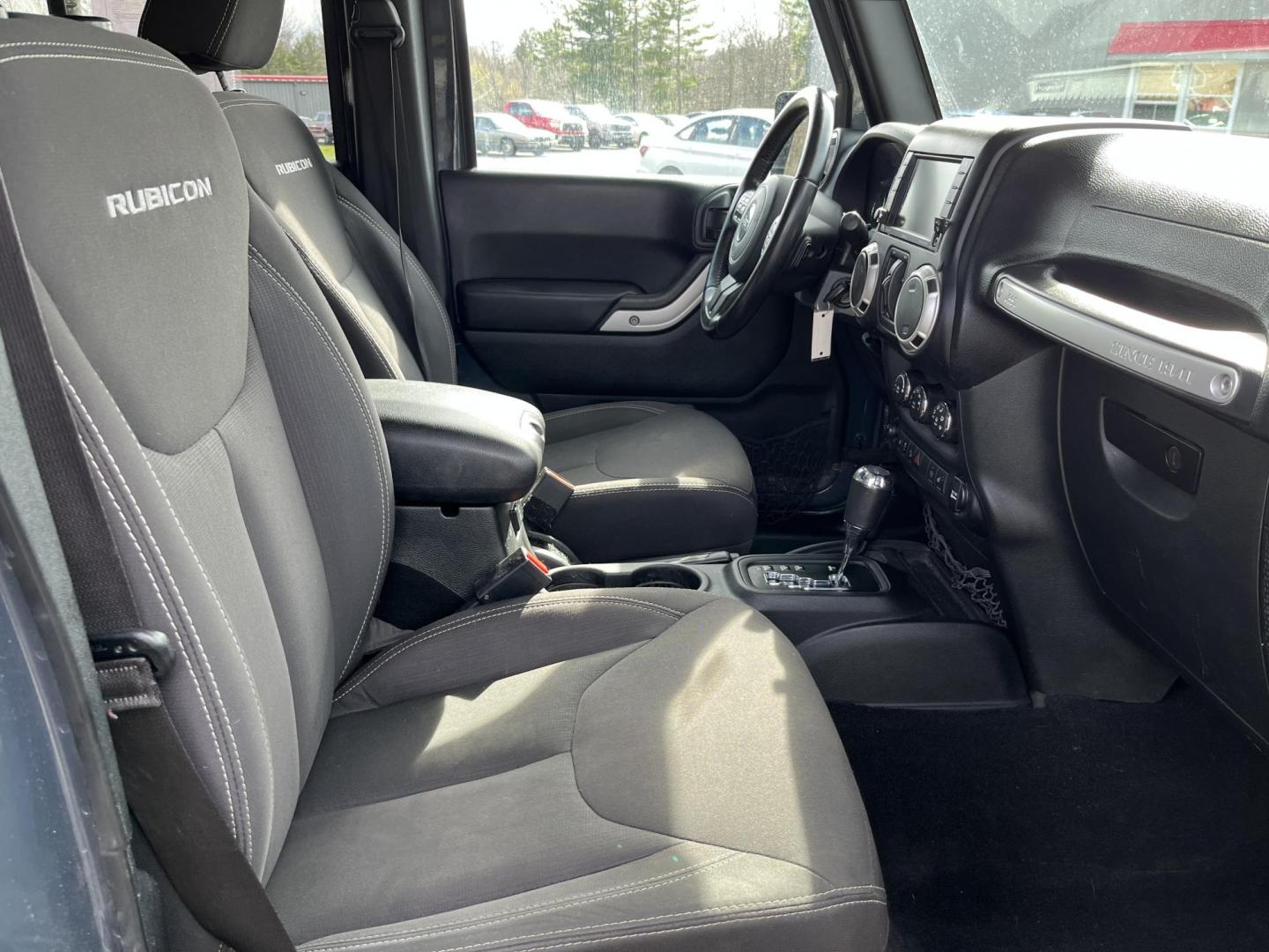 2017 Gray /Black Jeep Wrangler Unlimited Rubicon 4WD (1C4BJWFG8HL) with an 3.6L V6 DOHC 24V engine, Automatic transmission, located at 11115 Chardon Rd. , Chardon, OH, 44024, (440) 214-9705, 41.580246, -81.241943 - 2017 Jeep Wrangler Unlimited Rubicon – Trail-Conquering Beast with Full Rubicon Upgrades and Premium Features! This 2017 Jeep Wrangler Unlimited Rubicon is the ultimate off-road icon — highly capable, fun to drive, and loaded with factory Rubicon equipment! Powered by the reliable 3.6L Pentasta - Photo#29