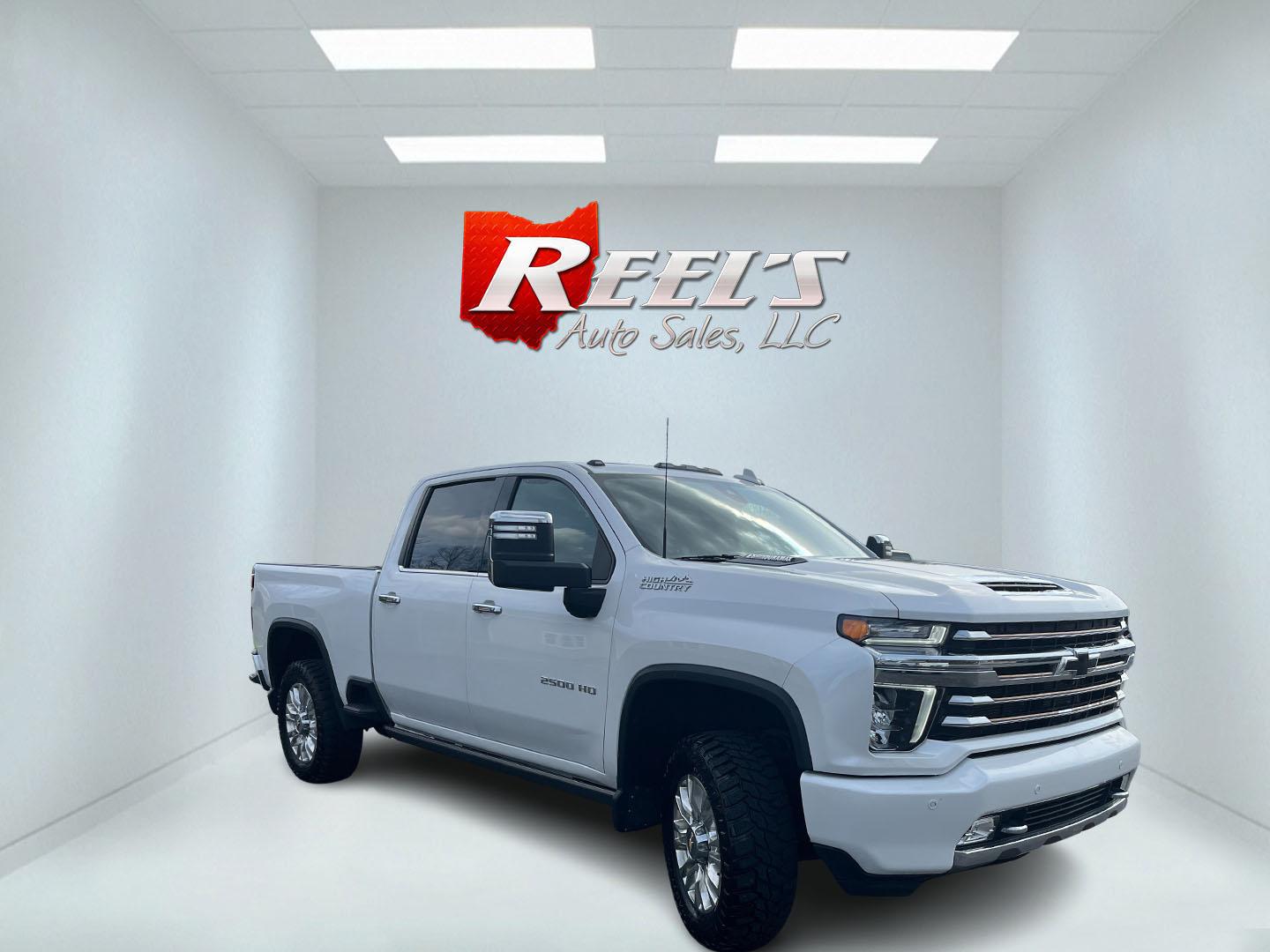 2021 White /Black Chevrolet Silverado 2500HD High Country Crew Cab Short Box 4WD (1GC4YREY0MF) with an 6.6L V8 OHV 16V DIESEL engine, Automatic transmission, located at 547 E. Main St., Orwell, OH, 44076, (440) 437-5893, 41.535435, -80.847855 - 2021 Chevrolet Silverado 2500 High Country Crew Cab 4WD – Loaded Luxury Duramax Beast with Massive Towing Power! This 2021 Chevrolet Silverado 2500 High Country Crew Cab 4WD is the ultimate top-of-the-line heavy-duty truck – premium luxury meets serious capability! Powered by the legendary 6.6L - Photo#2