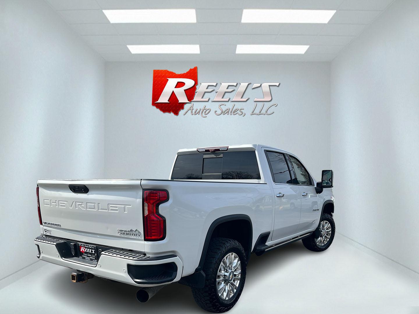 2021 White /Black Chevrolet Silverado 2500HD High Country Crew Cab Short Box 4WD (1GC4YREY0MF) with an 6.6L V8 OHV 16V DIESEL engine, Automatic transmission, located at 547 E. Main St., Orwell, OH, 44076, (440) 437-5893, 41.535435, -80.847855 - 2021 Chevrolet Silverado 2500 High Country Crew Cab 4WD – Loaded Luxury Duramax Beast with Massive Towing Power! This 2021 Chevrolet Silverado 2500 High Country Crew Cab 4WD is the ultimate top-of-the-line heavy-duty truck – premium luxury meets serious capability! Powered by the legendary 6.6L - Photo#6