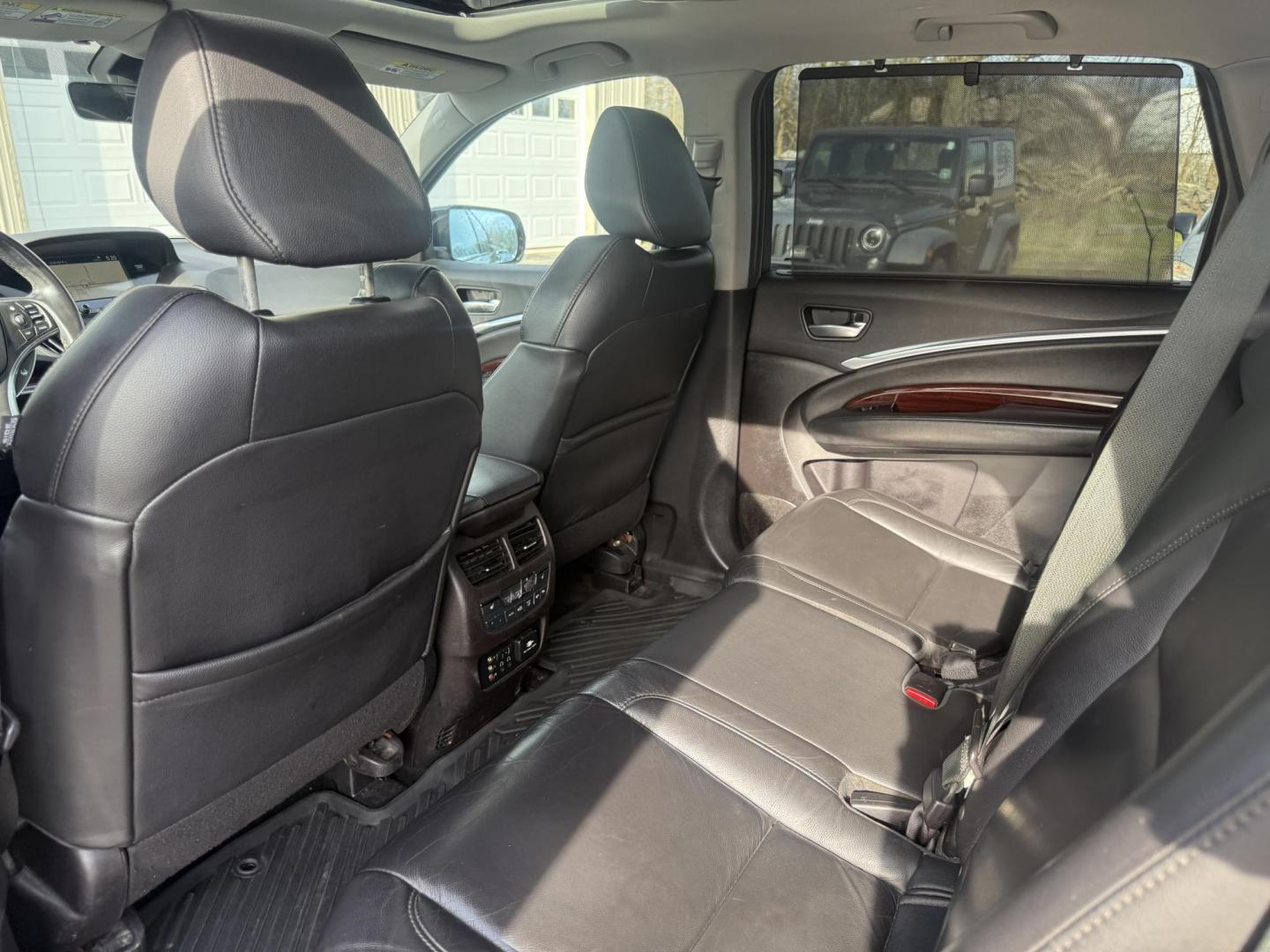 2016 Gray /Black Acura MDX SH-AWD 9-Spd AT w/Tech and Entertainment Package (5FRYD4H66GB) with an 3.5L V6 SOHC 24V engine, Automatic transmission, located at 547 E. Main St., Orwell, OH, 44076, (440) 437-5893, 41.535435, -80.847855 - 2016 Acura MDX SH-AWD with Technology & Rear Entertainment Packages – Luxury 3-Row SUV Loaded with Performance, Comfort, and Family Features! This stunning 2016 Acura MDX SH-AWD is the ultimate upscale family hauler that combines refined power, advanced safety, and premium luxury! Powered by a sm - Photo#36