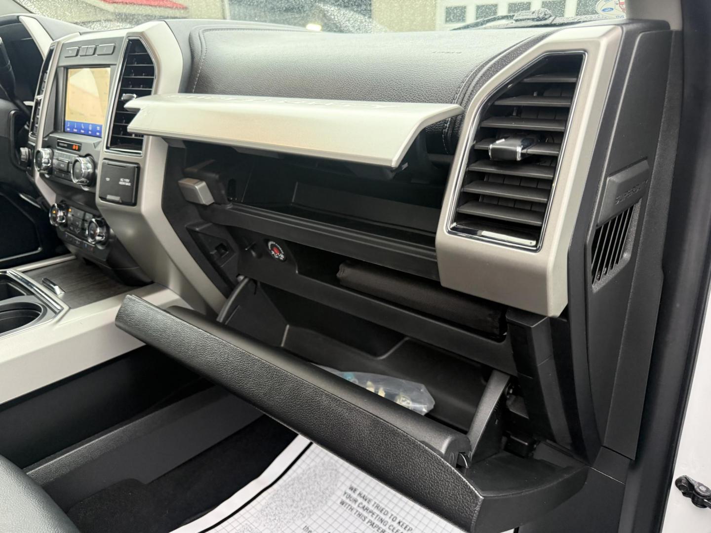 2020 White /Black Ford F-350 SD Lariat Crew Cab 4WD (1FT8W3B68LE) with an 6.2L V8 OHV 16V engine, Automatic transmission, located at 11115 Chardon Rd. , Chardon, OH, 44024, (440) 214-9705, 41.580246, -81.241943 - 2020 Ford F-350 Lariat Crew Cab 4WD – Loaded Heavy-Duty Luxury Truck with Massive Towing & FX4 Off-Road Capability! This 2020 Ford F-350 Lariat Crew Cab 4WD is a top-tier heavy-duty truck that combines premium luxury with serious work capability! Powered by the strong 6.2L V8 engine mated to a sm - Photo#46