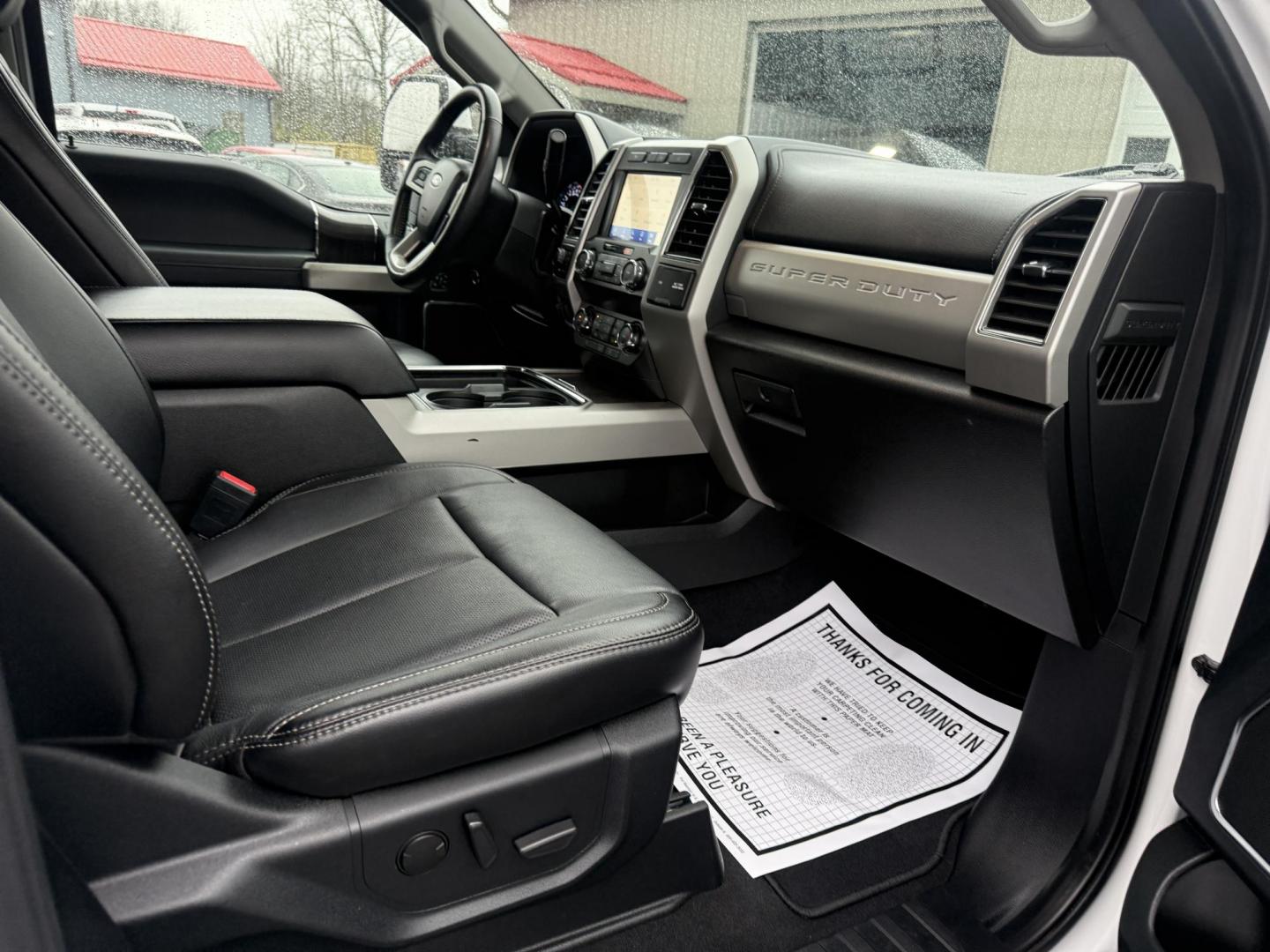 2020 White /Black Ford F-350 SD Lariat Crew Cab 4WD (1FT8W3B68LE) with an 6.2L V8 OHV 16V engine, Automatic transmission, located at 11115 Chardon Rd. , Chardon, OH, 44024, (440) 214-9705, 41.580246, -81.241943 - 2020 Ford F-350 Lariat Crew Cab 4WD – Loaded Heavy-Duty Luxury Truck with Massive Towing & FX4 Off-Road Capability! This 2020 Ford F-350 Lariat Crew Cab 4WD is a top-tier heavy-duty truck that combines premium luxury with serious work capability! Powered by the strong 6.2L V8 engine mated to a sm - Photo#44