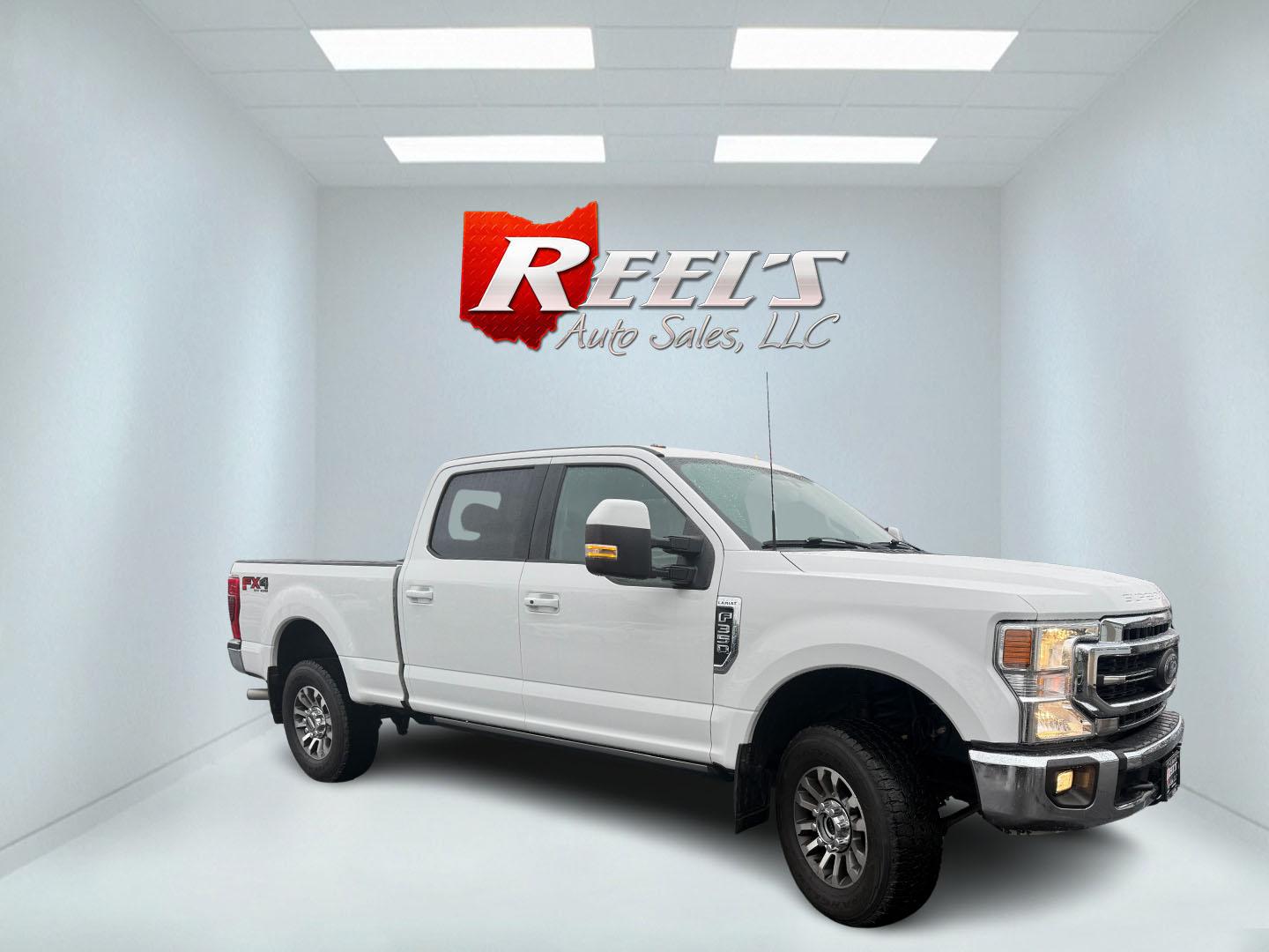 2020 White /Black Ford F-350 SD Lariat Crew Cab 4WD (1FT8W3B68LE) with an 6.2L V8 OHV 16V engine, Automatic transmission, located at 11115 Chardon Rd. , Chardon, OH, 44024, (440) 214-9705, 41.580246, -81.241943 - 2020 Ford F-350 Lariat Crew Cab 4WD – Loaded Heavy-Duty Luxury Truck with Massive Towing & FX4 Off-Road Capability! This 2020 Ford F-350 Lariat Crew Cab 4WD is a top-tier heavy-duty truck that combines premium luxury with serious work capability! Powered by the strong 6.2L V8 engine mated to a sm - Photo#3