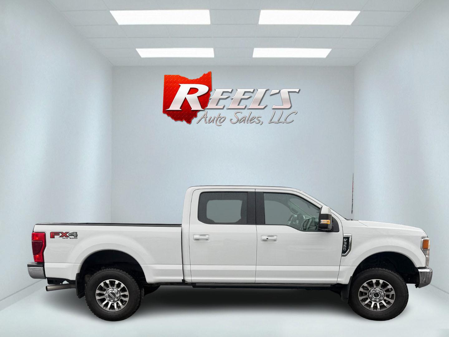 2020 White /Black Ford F-350 SD Lariat Crew Cab 4WD (1FT8W3B68LE) with an 6.2L V8 OHV 16V engine, Automatic transmission, located at 11115 Chardon Rd. , Chardon, OH, 44024, (440) 214-9705, 41.580246, -81.241943 - 2020 Ford F-350 Lariat Crew Cab 4WD – Loaded Heavy-Duty Luxury Truck with Massive Towing & FX4 Off-Road Capability! This 2020 Ford F-350 Lariat Crew Cab 4WD is a top-tier heavy-duty truck that combines premium luxury with serious work capability! Powered by the strong 6.2L V8 engine mated to a sm - Photo#8