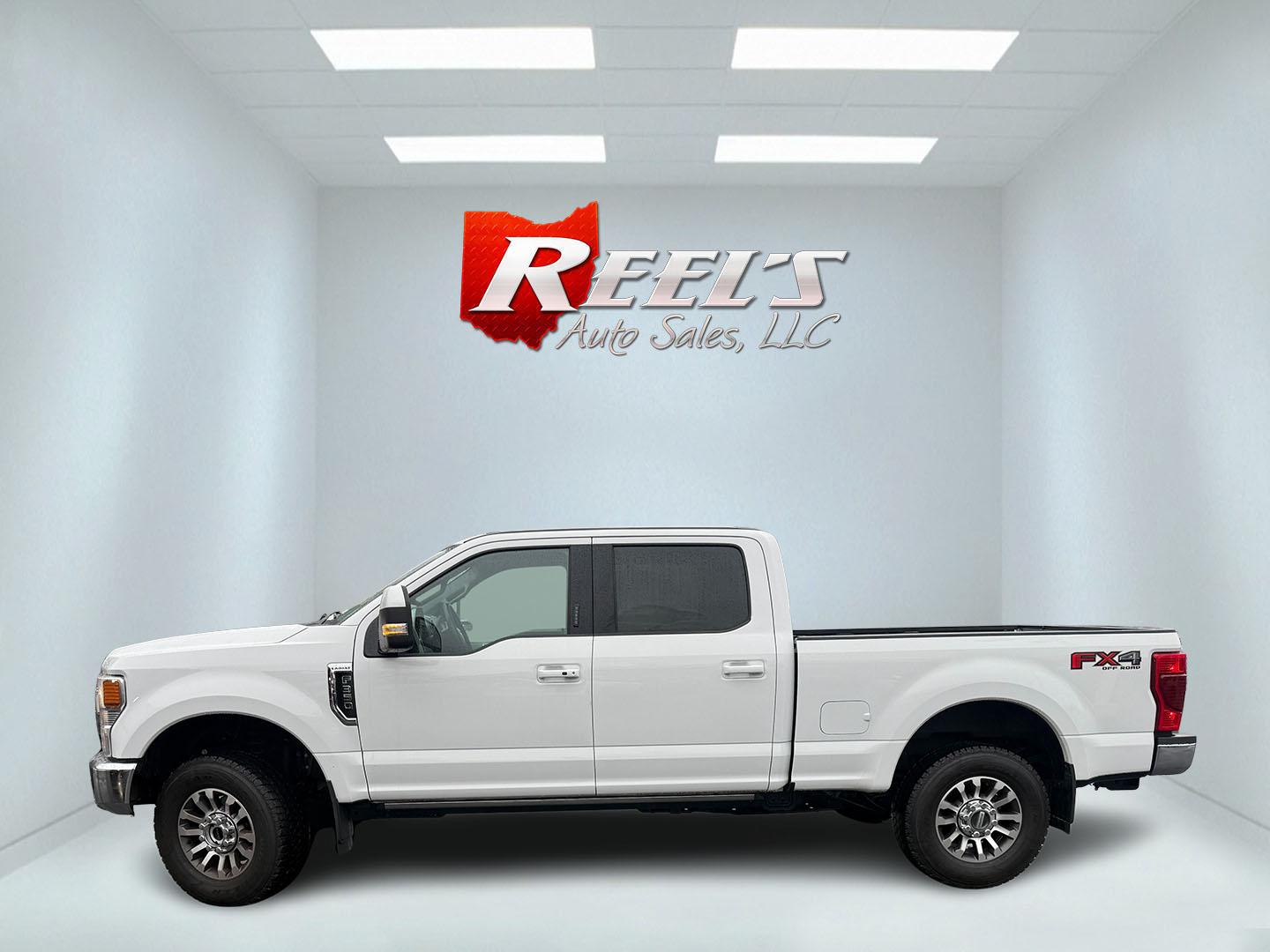 2020 White /Black Ford F-350 SD Lariat Crew Cab 4WD (1FT8W3B68LE) with an 6.2L V8 OHV 16V engine, Automatic transmission, located at 11115 Chardon Rd. , Chardon, OH, 44024, (440) 214-9705, 41.580246, -81.241943 - 2020 Ford F-350 Lariat Crew Cab 4WD – Loaded Heavy-Duty Luxury Truck with Massive Towing & FX4 Off-Road Capability! This 2020 Ford F-350 Lariat Crew Cab 4WD is a top-tier heavy-duty truck that combines premium luxury with serious work capability! Powered by the strong 6.2L V8 engine mated to a sm - Photo#16