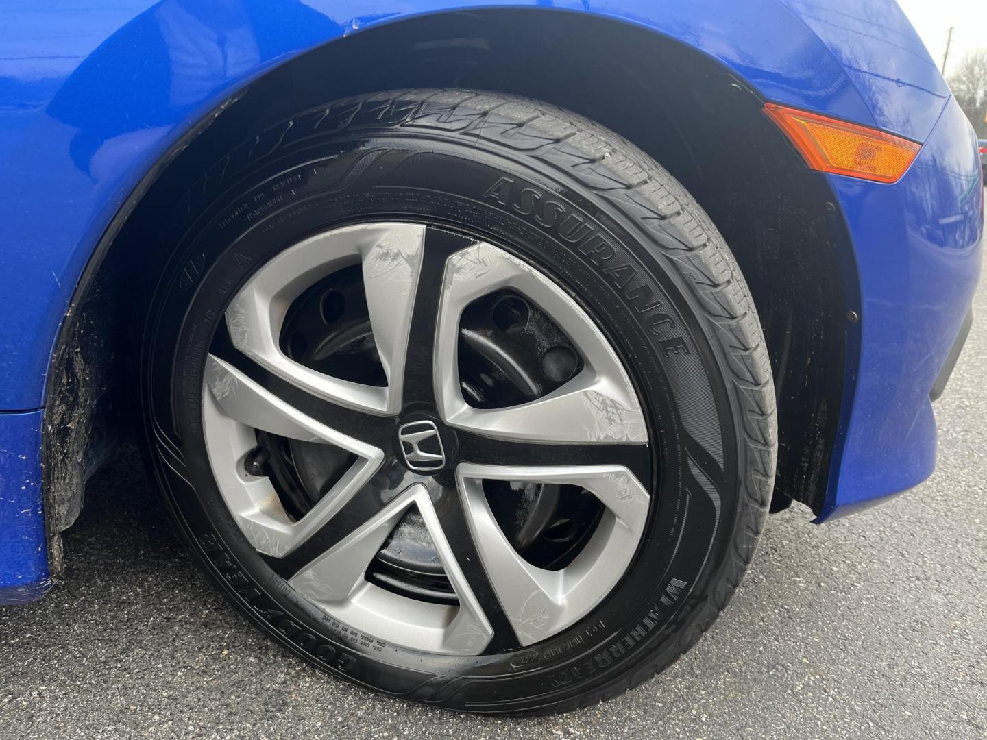 2017 Blue /Black Honda Civic LX Sedan CVT (19XFC2F50HE) with an 2.0L I4 DOHC 16V engine, Automatic transmission, located at 11115 Chardon Rd. , Chardon, OH, 44024, (440) 214-9705, 41.580246, -81.241943 - 2017 Honda Civic LX Sedan – Efficient, Reliable, and Loaded with Smart Features! This clean 2017 Honda Civic LX Sedan is the perfect daily driver that combines excellent fuel economy, modern tech, and Honda’s legendary reliability! Powered by a smooth 2.0L I4 engine, it delivers responsive perf - Photo#4