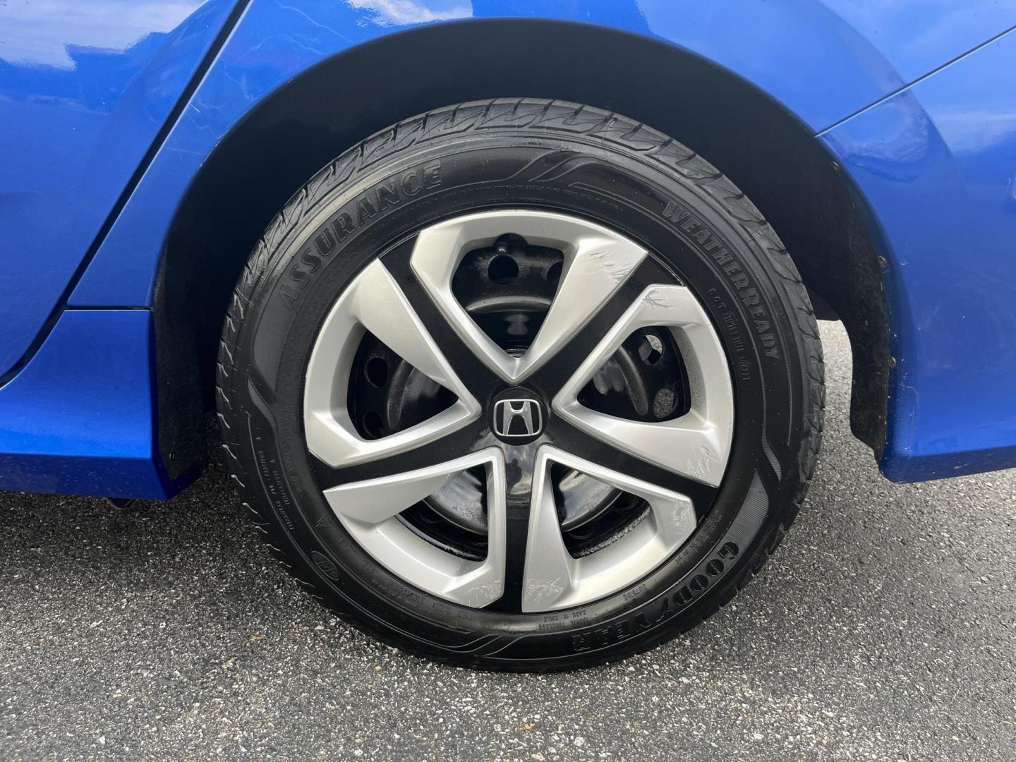 2017 Blue /Black Honda Civic LX Sedan CVT (19XFC2F50HE) with an 2.0L I4 DOHC 16V engine, Automatic transmission, located at 11115 Chardon Rd. , Chardon, OH, 44024, (440) 214-9705, 41.580246, -81.241943 - 2017 Honda Civic LX Sedan – Efficient, Reliable, and Loaded with Smart Features! This clean 2017 Honda Civic LX Sedan is the perfect daily driver that combines excellent fuel economy, modern tech, and Honda’s legendary reliability! Powered by a smooth 2.0L I4 engine, it delivers responsive perf - Photo#10