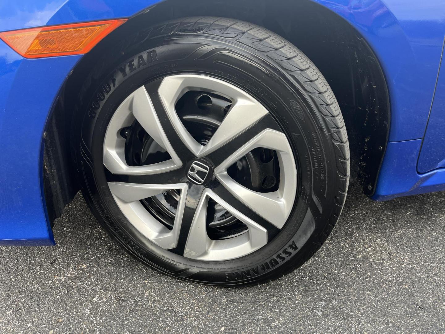 2017 Blue /Black Honda Civic LX Sedan CVT (19XFC2F50HE) with an 2.0L I4 DOHC 16V engine, Automatic transmission, located at 11115 Chardon Rd. , Chardon, OH, 44024, (440) 214-9705, 41.580246, -81.241943 - 2017 Honda Civic LX Sedan – Efficient, Reliable, and Loaded with Smart Features! This clean 2017 Honda Civic LX Sedan is the perfect daily driver that combines excellent fuel economy, modern tech, and Honda’s legendary reliability! Powered by a smooth 2.0L I4 engine, it delivers responsive perf - Photo#12