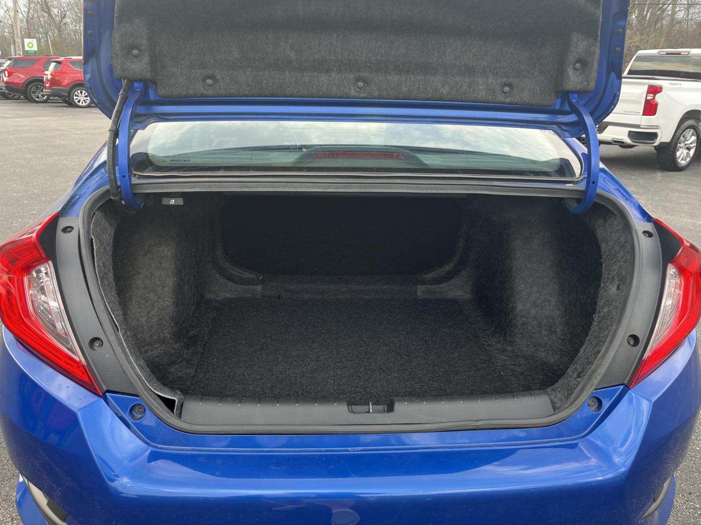 2017 Blue /Black Honda Civic LX Sedan CVT (19XFC2F50HE) with an 2.0L I4 DOHC 16V engine, Automatic transmission, located at 11115 Chardon Rd. , Chardon, OH, 44024, (440) 214-9705, 41.580246, -81.241943 - 2017 Honda Civic LX Sedan – Efficient, Reliable, and Loaded with Smart Features! This clean 2017 Honda Civic LX Sedan is the perfect daily driver that combines excellent fuel economy, modern tech, and Honda’s legendary reliability! Powered by a smooth 2.0L I4 engine, it delivers responsive perf - Photo#14