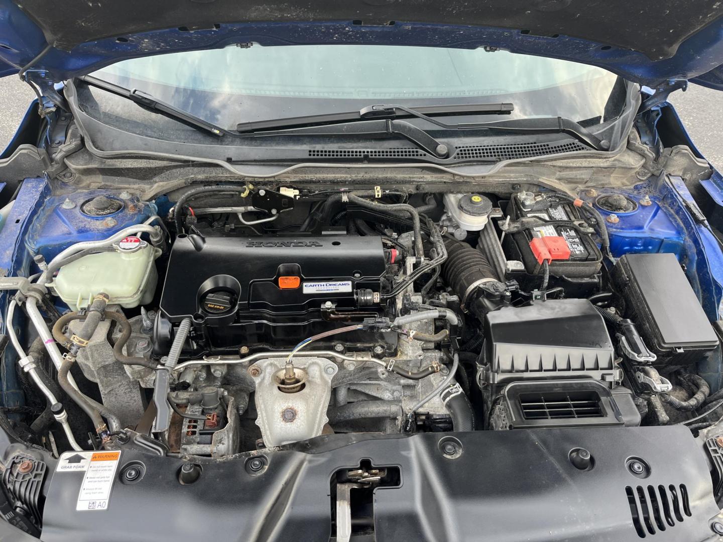 2017 Blue /Black Honda Civic LX Sedan CVT (19XFC2F50HE) with an 2.0L I4 DOHC 16V engine, Automatic transmission, located at 11115 Chardon Rd. , Chardon, OH, 44024, (440) 214-9705, 41.580246, -81.241943 - 2017 Honda Civic LX Sedan – Efficient, Reliable, and Loaded with Smart Features! This clean 2017 Honda Civic LX Sedan is the perfect daily driver that combines excellent fuel economy, modern tech, and Honda’s legendary reliability! Powered by a smooth 2.0L I4 engine, it delivers responsive perf - Photo#13