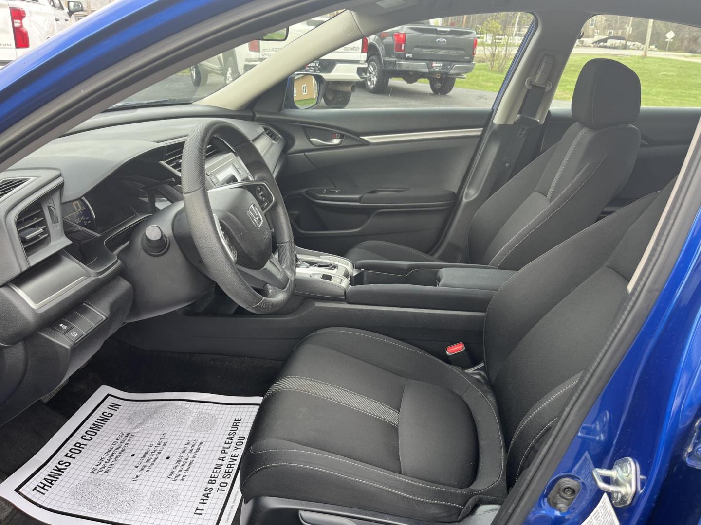 2017 Blue /Black Honda Civic LX Sedan CVT (19XFC2F50HE) with an 2.0L I4 DOHC 16V engine, Automatic transmission, located at 11115 Chardon Rd. , Chardon, OH, 44024, (440) 214-9705, 41.580246, -81.241943 - 2017 Honda Civic LX Sedan – Efficient, Reliable, and Loaded with Smart Features! This clean 2017 Honda Civic LX Sedan is the perfect daily driver that combines excellent fuel economy, modern tech, and Honda’s legendary reliability! Powered by a smooth 2.0L I4 engine, it delivers responsive perf - Photo#16
