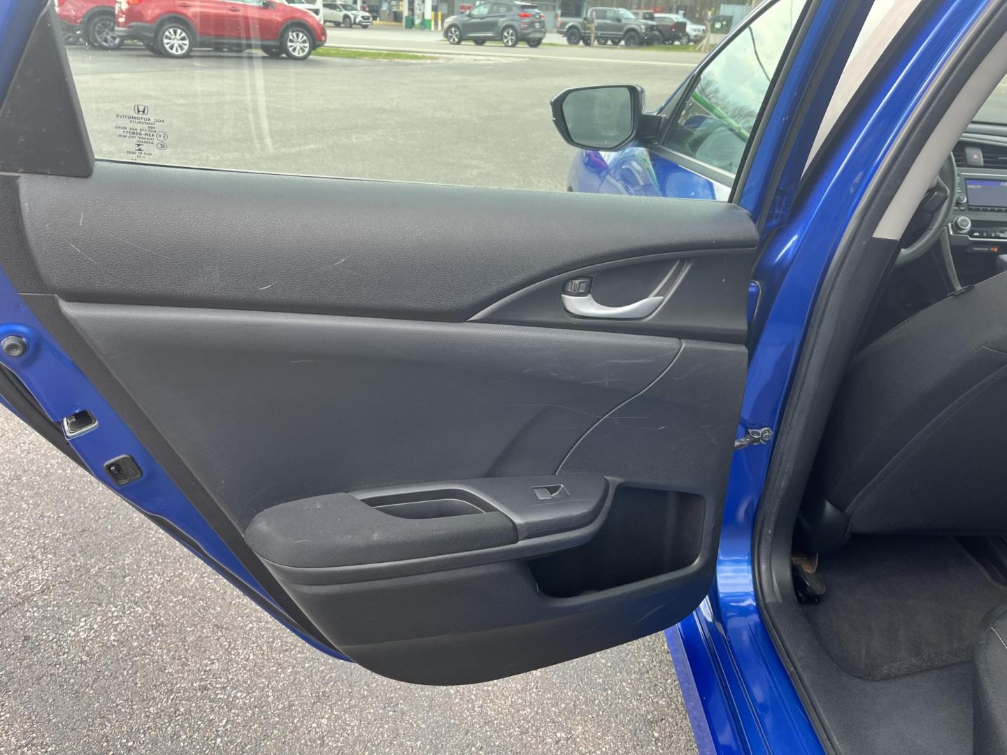 2017 Blue /Black Honda Civic LX Sedan CVT (19XFC2F50HE) with an 2.0L I4 DOHC 16V engine, Automatic transmission, located at 11115 Chardon Rd. , Chardon, OH, 44024, (440) 214-9705, 41.580246, -81.241943 - 2017 Honda Civic LX Sedan – Efficient, Reliable, and Loaded with Smart Features! This clean 2017 Honda Civic LX Sedan is the perfect daily driver that combines excellent fuel economy, modern tech, and Honda’s legendary reliability! Powered by a smooth 2.0L I4 engine, it delivers responsive perf - Photo#21