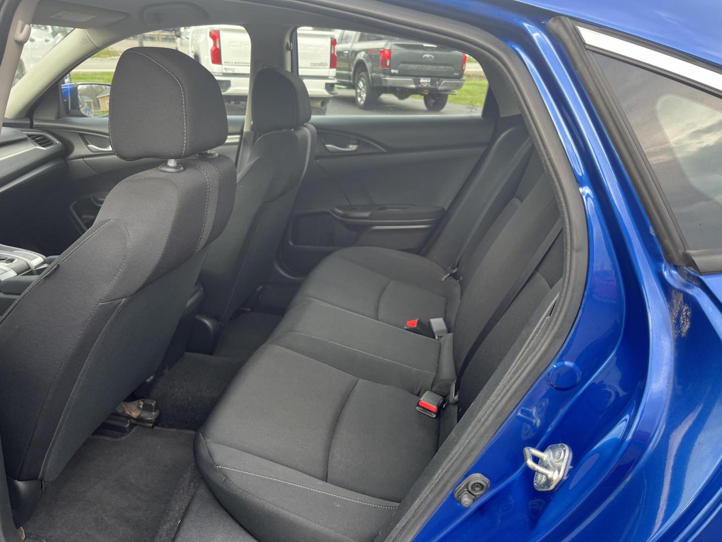 2017 Blue /Black Honda Civic LX Sedan CVT (19XFC2F50HE) with an 2.0L I4 DOHC 16V engine, Automatic transmission, located at 11115 Chardon Rd. , Chardon, OH, 44024, (440) 214-9705, 41.580246, -81.241943 - 2017 Honda Civic LX Sedan – Efficient, Reliable, and Loaded with Smart Features! This clean 2017 Honda Civic LX Sedan is the perfect daily driver that combines excellent fuel economy, modern tech, and Honda’s legendary reliability! Powered by a smooth 2.0L I4 engine, it delivers responsive perf - Photo#22