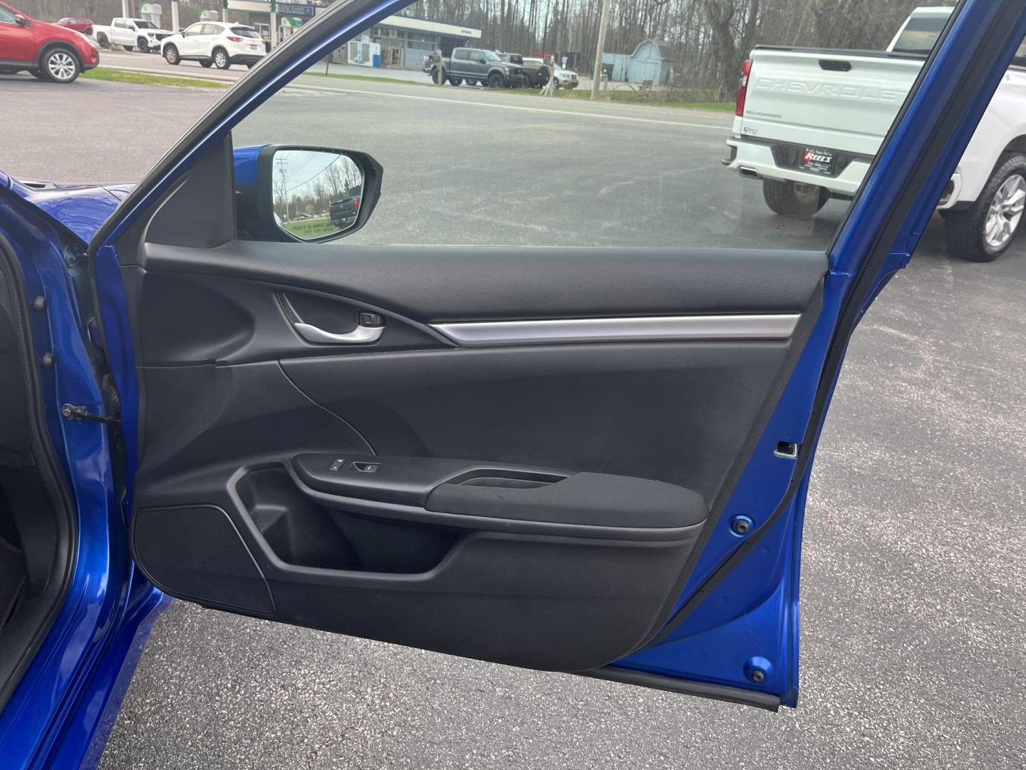 2017 Blue /Black Honda Civic LX Sedan CVT (19XFC2F50HE) with an 2.0L I4 DOHC 16V engine, Automatic transmission, located at 11115 Chardon Rd. , Chardon, OH, 44024, (440) 214-9705, 41.580246, -81.241943 - 2017 Honda Civic LX Sedan – Efficient, Reliable, and Loaded with Smart Features! This clean 2017 Honda Civic LX Sedan is the perfect daily driver that combines excellent fuel economy, modern tech, and Honda’s legendary reliability! Powered by a smooth 2.0L I4 engine, it delivers responsive perf - Photo#24