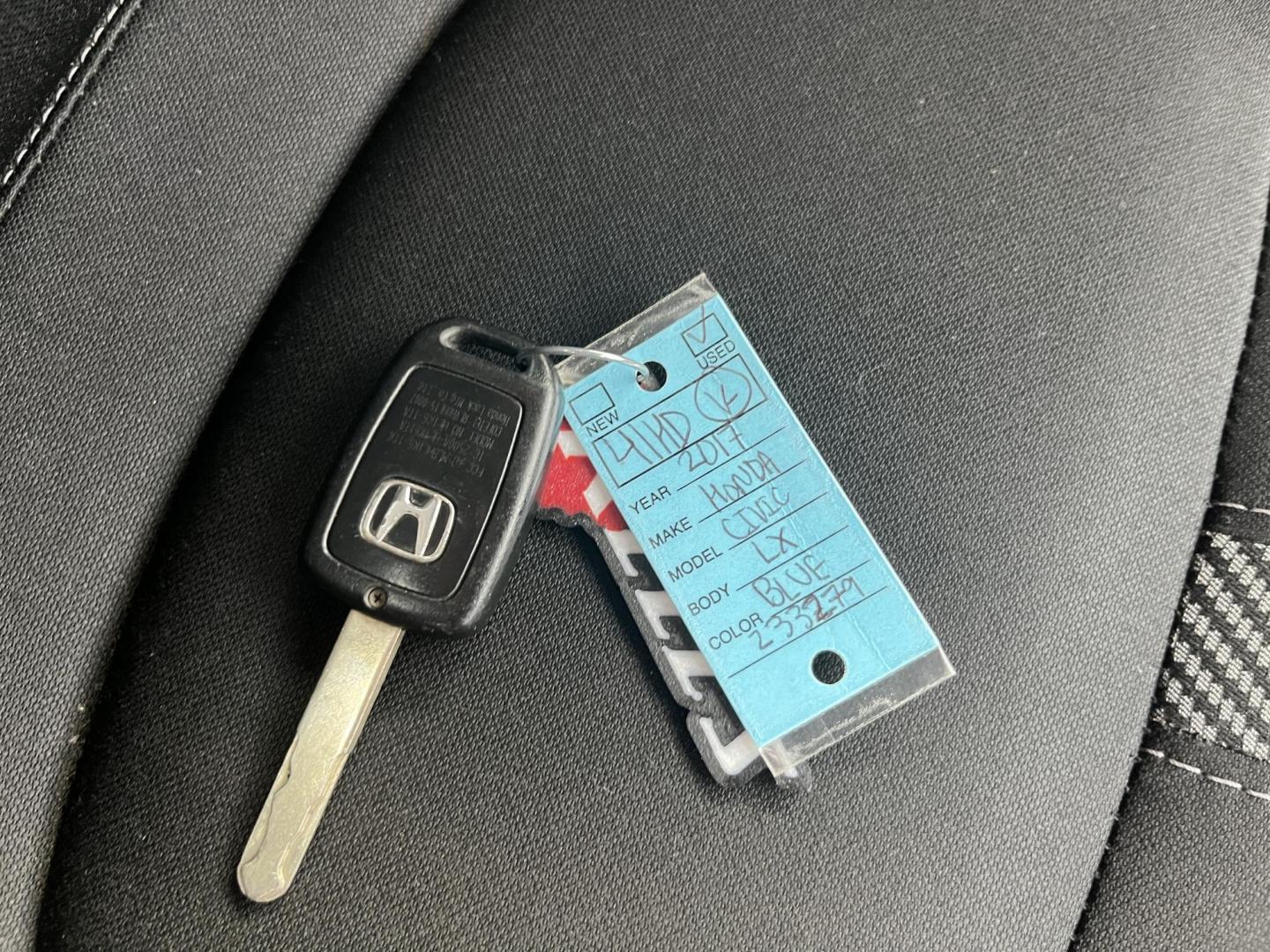 2017 Blue /Black Honda Civic LX Sedan CVT (19XFC2F50HE) with an 2.0L I4 DOHC 16V engine, Automatic transmission, located at 11115 Chardon Rd. , Chardon, OH, 44024, (440) 214-9705, 41.580246, -81.241943 - 2017 Honda Civic LX Sedan – Efficient, Reliable, and Loaded with Smart Features! This clean 2017 Honda Civic LX Sedan is the perfect daily driver that combines excellent fuel economy, modern tech, and Honda’s legendary reliability! Powered by a smooth 2.0L I4 engine, it delivers responsive perf - Photo#26