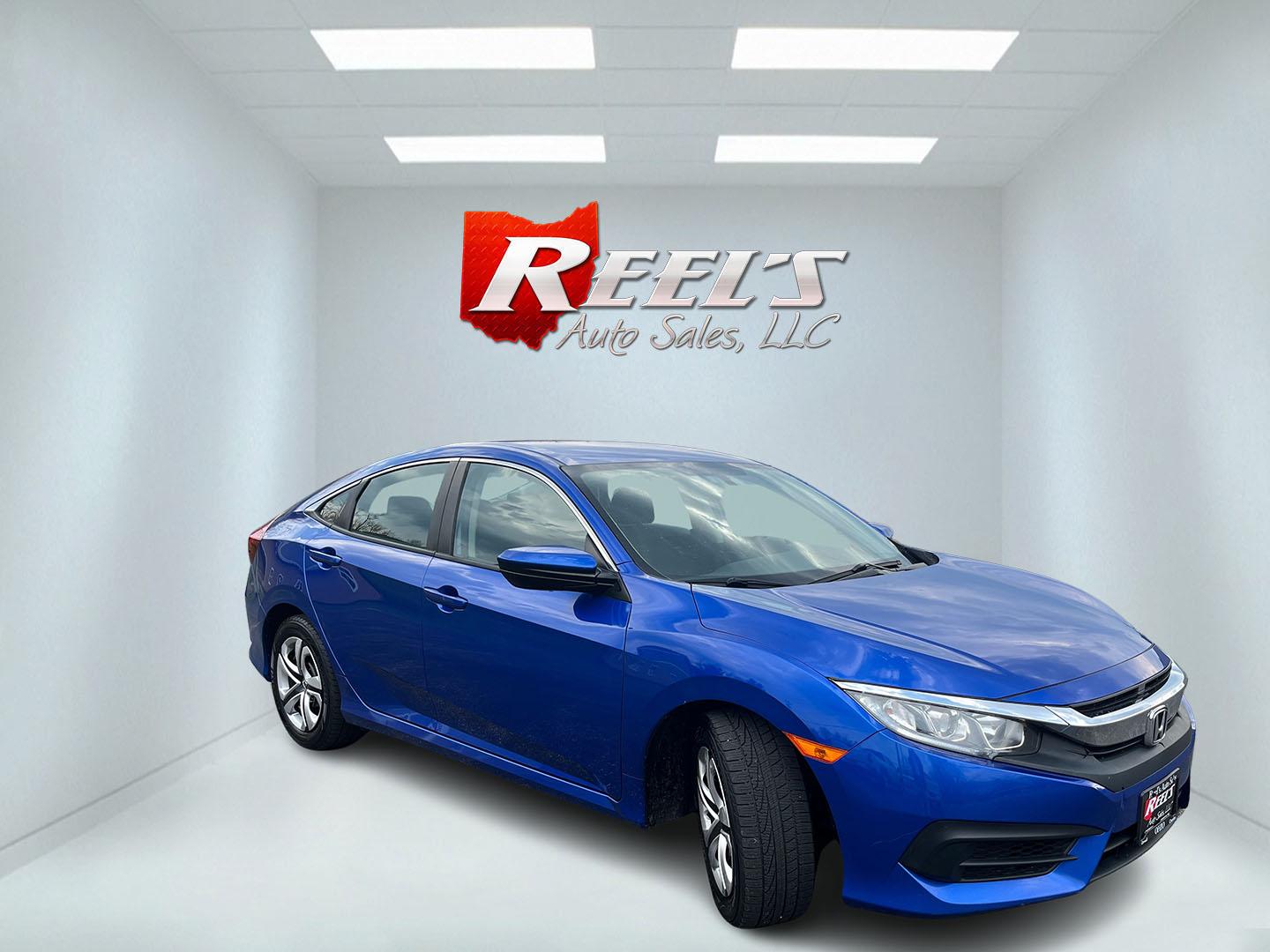2017 Blue /Black Honda Civic LX Sedan CVT (19XFC2F50HE) with an 2.0L I4 DOHC 16V engine, Automatic transmission, located at 11115 Chardon Rd. , Chardon, OH, 44024, (440) 214-9705, 41.580246, -81.241943 - 2017 Honda Civic LX Sedan – Efficient, Reliable, and Loaded with Smart Features! This clean 2017 Honda Civic LX Sedan is the perfect daily driver that combines excellent fuel economy, modern tech, and Honda’s legendary reliability! Powered by a smooth 2.0L I4 engine, it delivers responsive perf - Photo#2