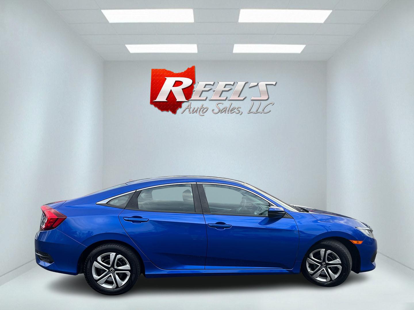 2017 Blue /Black Honda Civic LX Sedan CVT (19XFC2F50HE) with an 2.0L I4 DOHC 16V engine, Automatic transmission, located at 11115 Chardon Rd. , Chardon, OH, 44024, (440) 214-9705, 41.580246, -81.241943 - 2017 Honda Civic LX Sedan – Efficient, Reliable, and Loaded with Smart Features! This clean 2017 Honda Civic LX Sedan is the perfect daily driver that combines excellent fuel economy, modern tech, and Honda’s legendary reliability! Powered by a smooth 2.0L I4 engine, it delivers responsive perf - Photo#5