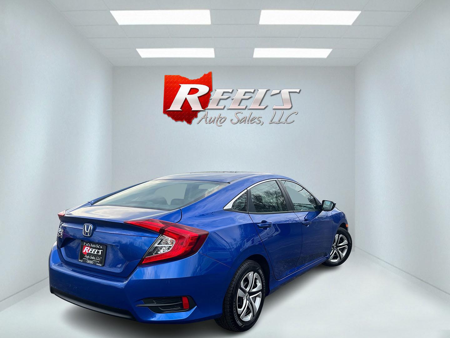 2017 Blue /Black Honda Civic LX Sedan CVT (19XFC2F50HE) with an 2.0L I4 DOHC 16V engine, Automatic transmission, located at 11115 Chardon Rd. , Chardon, OH, 44024, (440) 214-9705, 41.580246, -81.241943 - 2017 Honda Civic LX Sedan – Efficient, Reliable, and Loaded with Smart Features! This clean 2017 Honda Civic LX Sedan is the perfect daily driver that combines excellent fuel economy, modern tech, and Honda’s legendary reliability! Powered by a smooth 2.0L I4 engine, it delivers responsive perf - Photo#6