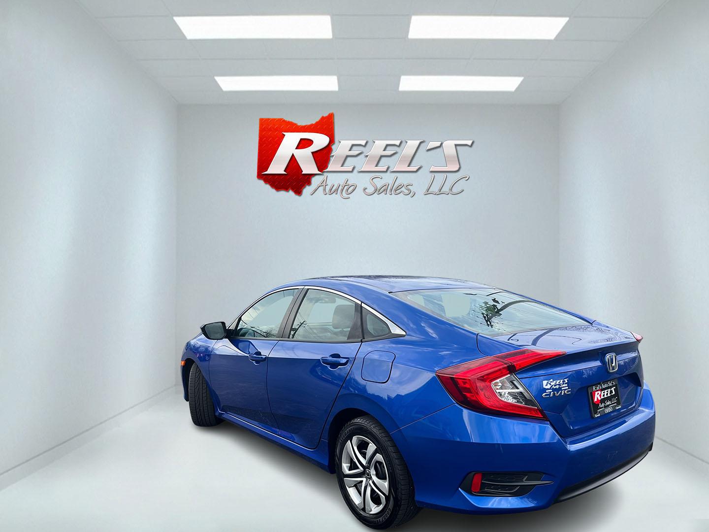 2017 Blue /Black Honda Civic LX Sedan CVT (19XFC2F50HE) with an 2.0L I4 DOHC 16V engine, Automatic transmission, located at 11115 Chardon Rd. , Chardon, OH, 44024, (440) 214-9705, 41.580246, -81.241943 - 2017 Honda Civic LX Sedan – Efficient, Reliable, and Loaded with Smart Features! This clean 2017 Honda Civic LX Sedan is the perfect daily driver that combines excellent fuel economy, modern tech, and Honda’s legendary reliability! Powered by a smooth 2.0L I4 engine, it delivers responsive perf - Photo#9