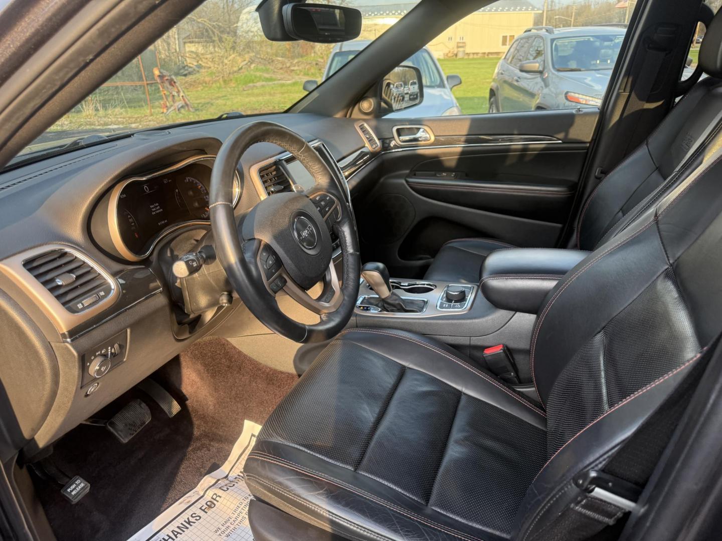 2017 Gray /Black Jeep Grand Cherokee Limited 4WD (1C4RJFBG0HC) with an 3.6L V6 DOHC 24V engine, Automatic transmission, located at 547 E. Main St., Orwell, OH, 44076, (440) 437-5893, 41.535435, -80.847855 - 2017 Jeep Grand Cherokee Limited 4WD 75th Anniversary Edition – Premium, Loaded, and Ready for Any Adventure! This special 2017 Jeep Grand Cherokee Limited 4WD 75th Anniversary Edition is a standout example of Jeep luxury and capability! Powered by the smooth 3.6L Pentastar V6 engine paired with - Photo#15