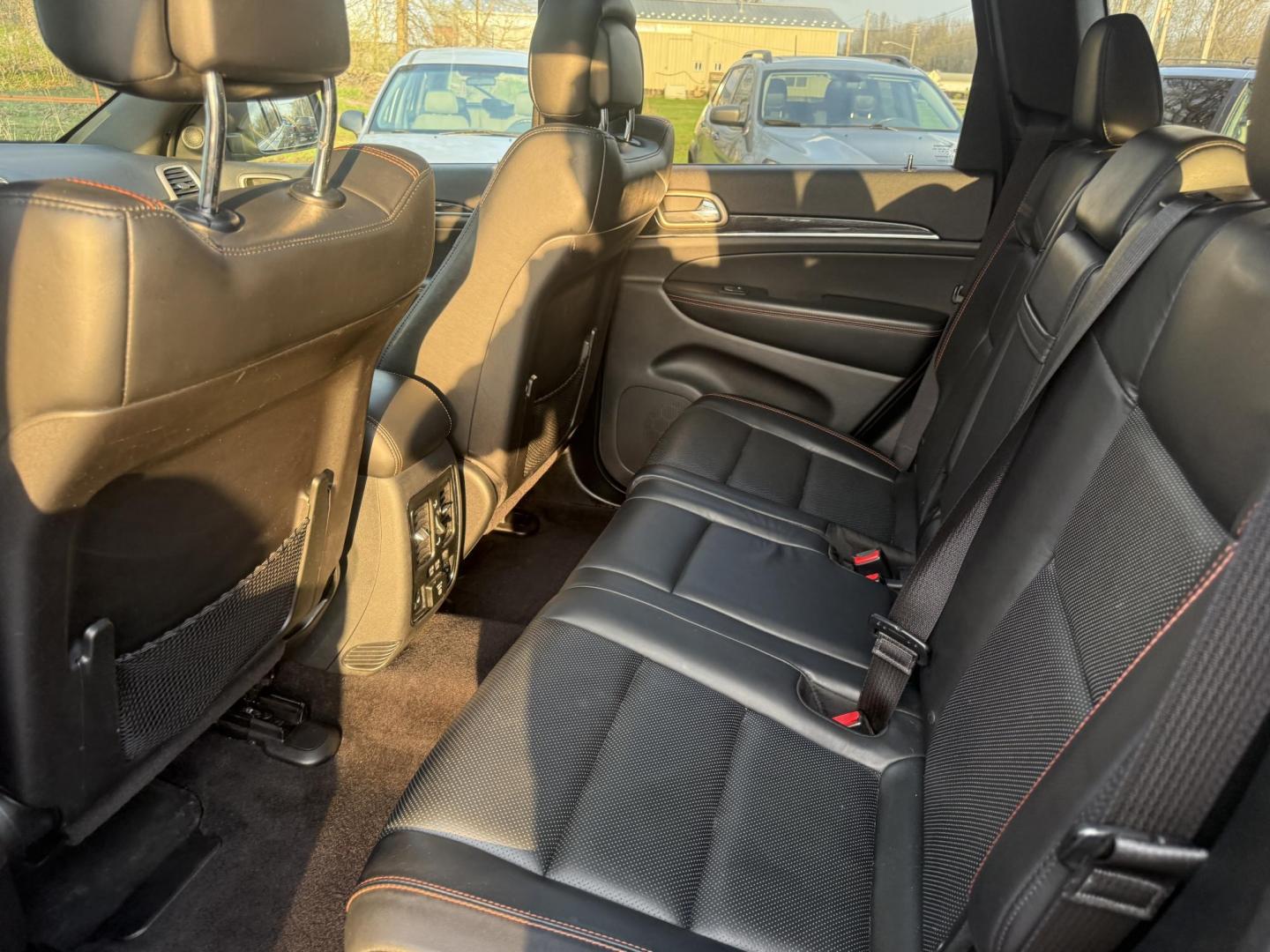 2017 Gray /Black Jeep Grand Cherokee Limited 4WD (1C4RJFBG0HC) with an 3.6L V6 DOHC 24V engine, Automatic transmission, located at 547 E. Main St., Orwell, OH, 44076, (440) 437-5893, 41.535435, -80.847855 - 2017 Jeep Grand Cherokee Limited 4WD 75th Anniversary Edition – Premium, Loaded, and Ready for Any Adventure! This special 2017 Jeep Grand Cherokee Limited 4WD 75th Anniversary Edition is a standout example of Jeep luxury and capability! Powered by the smooth 3.6L Pentastar V6 engine paired with - Photo#34