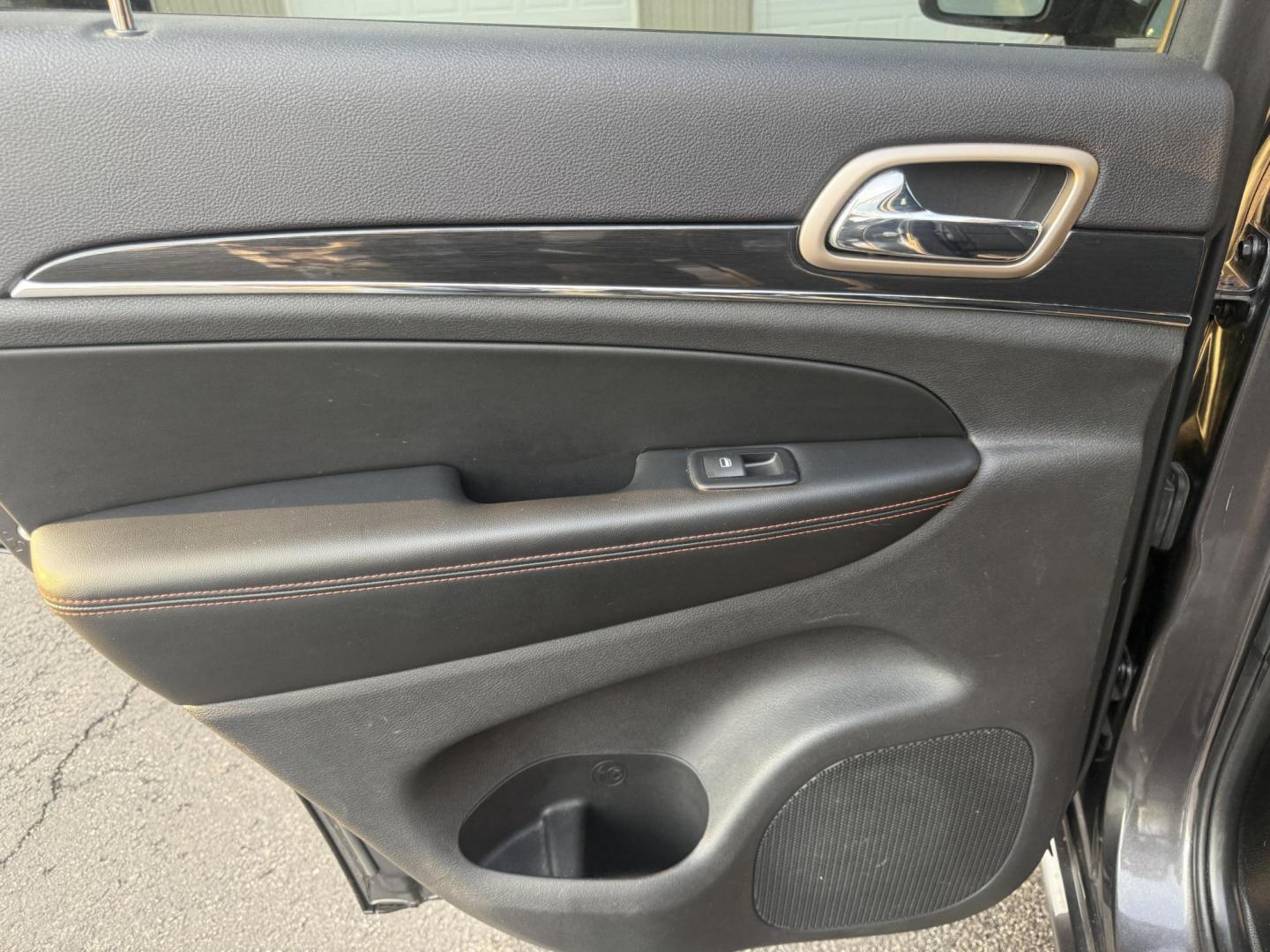 2017 Gray /Black Jeep Grand Cherokee Limited 4WD (1C4RJFBG0HC) with an 3.6L V6 DOHC 24V engine, Automatic transmission, located at 547 E. Main St., Orwell, OH, 44076, (440) 437-5893, 41.535435, -80.847855 - 2017 Jeep Grand Cherokee Limited 4WD 75th Anniversary Edition – Premium, Loaded, and Ready for Any Adventure! This special 2017 Jeep Grand Cherokee Limited 4WD 75th Anniversary Edition is a standout example of Jeep luxury and capability! Powered by the smooth 3.6L Pentastar V6 engine paired with - Photo#35