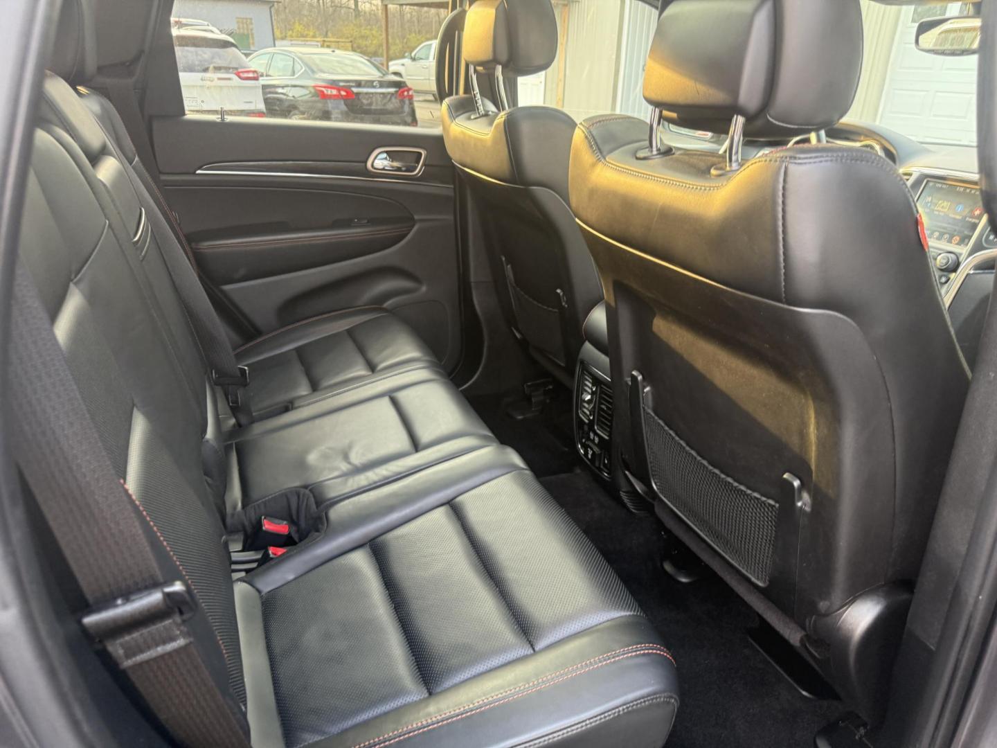 2017 Gray /Black Jeep Grand Cherokee Limited 4WD (1C4RJFBG0HC) with an 3.6L V6 DOHC 24V engine, Automatic transmission, located at 547 E. Main St., Orwell, OH, 44076, (440) 437-5893, 41.535435, -80.847855 - 2017 Jeep Grand Cherokee Limited 4WD 75th Anniversary Edition – Premium, Loaded, and Ready for Any Adventure! This special 2017 Jeep Grand Cherokee Limited 4WD 75th Anniversary Edition is a standout example of Jeep luxury and capability! Powered by the smooth 3.6L Pentastar V6 engine paired with - Photo#41