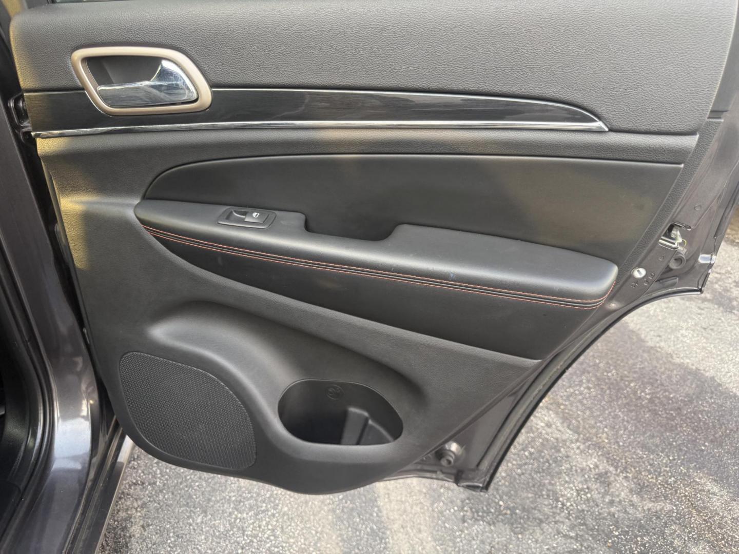 2017 Gray /Black Jeep Grand Cherokee Limited 4WD (1C4RJFBG0HC) with an 3.6L V6 DOHC 24V engine, Automatic transmission, located at 547 E. Main St., Orwell, OH, 44076, (440) 437-5893, 41.535435, -80.847855 - 2017 Jeep Grand Cherokee Limited 4WD 75th Anniversary Edition – Premium, Loaded, and Ready for Any Adventure! This special 2017 Jeep Grand Cherokee Limited 4WD 75th Anniversary Edition is a standout example of Jeep luxury and capability! Powered by the smooth 3.6L Pentastar V6 engine paired with - Photo#42