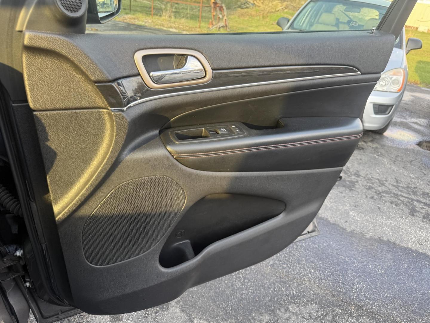 2017 Gray /Black Jeep Grand Cherokee Limited 4WD (1C4RJFBG0HC) with an 3.6L V6 DOHC 24V engine, Automatic transmission, located at 547 E. Main St., Orwell, OH, 44076, (440) 437-5893, 41.535435, -80.847855 - 2017 Jeep Grand Cherokee Limited 4WD 75th Anniversary Edition – Premium, Loaded, and Ready for Any Adventure! This special 2017 Jeep Grand Cherokee Limited 4WD 75th Anniversary Edition is a standout example of Jeep luxury and capability! Powered by the smooth 3.6L Pentastar V6 engine paired with - Photo#48