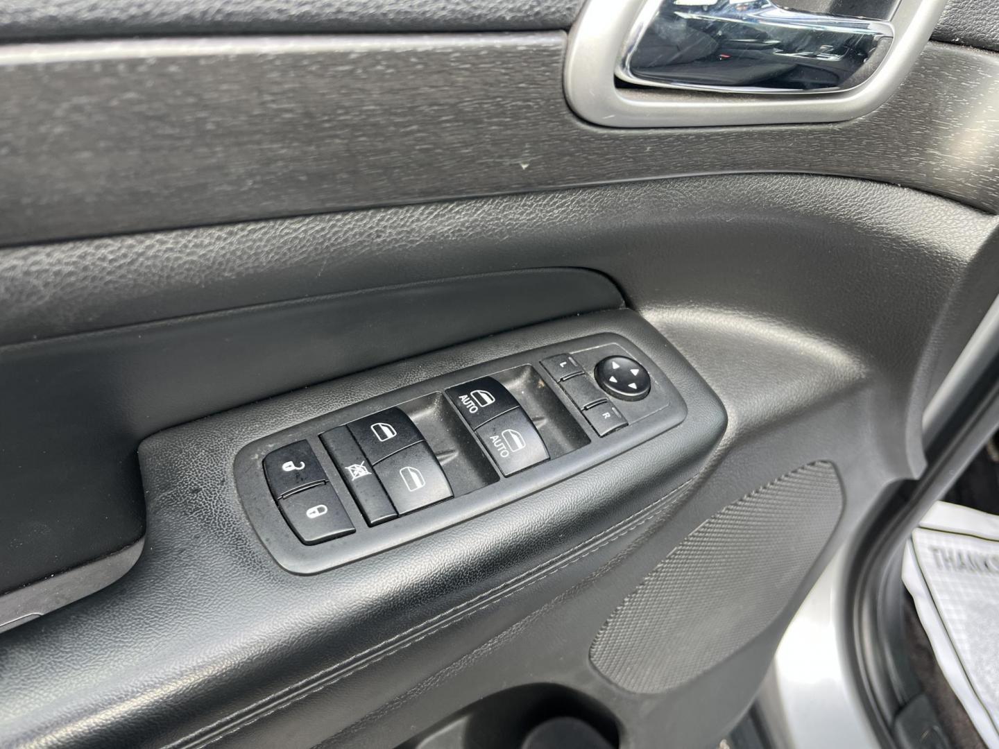 2018 Silver /Black Jeep Grand Cherokee Laredo 4WD (1C4RJFAG9JC) with an 3.6L V6 DOHC 24V engine, Automatic transmission, located at 11115 Chardon Rd. , Chardon, OH, 44024, (440) 214-9705, 41.580246, -81.241943 - 2018 Jeep Grand Cherokee Laredo E 4WD – Clean, Capable, and Well-Equipped! This 2018 Jeep Grand Cherokee Laredo E 4WD is a sharp, versatile midsize SUV that offers great value with solid capability and modern features. Powered by the smooth 3.6L Pentastar V6 engine paired with an 8-speed automati - Photo#16